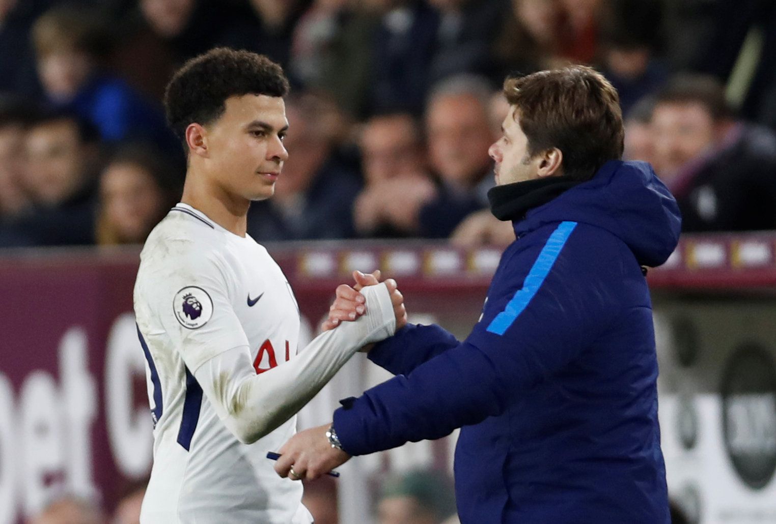 Soccer Football - Premier League - Burnley vs Tottenham Hotspur - Turf Moor, Burnley, Britain - December 23, 2017   Tottenham's Dele Alli with Tottenham manager Mauricio Pochettino after he is substituted   Action Images via Reuters/Paul Childs    EDITORIAL USE ONLY. No use with unauthorized audio, video, data, fixture lists, club/league logos or "live" services. Online in-match use limited to 75 images, no video emulation. No use in betting, games or single club/league/player publications.  Ple