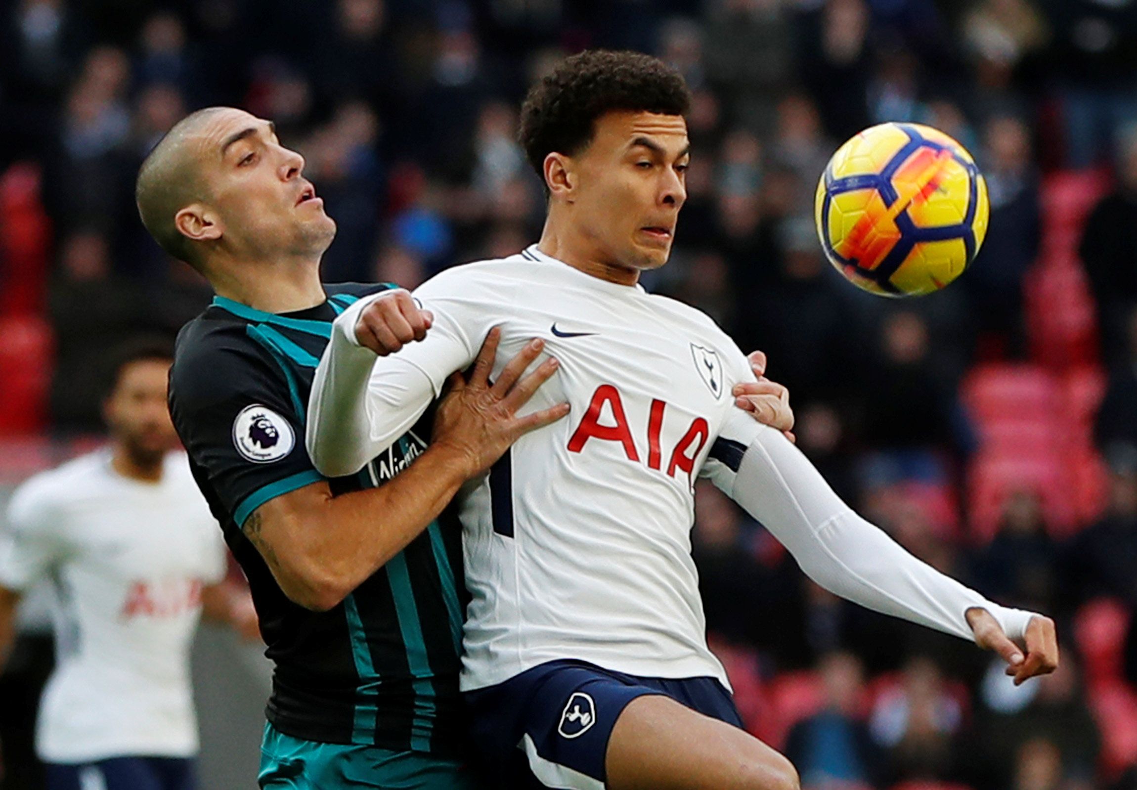 Soccer Football - Premier League - Tottenham Hotspur vs Southampton - Wembley Stadium, London, Britain - December 26, 2017   Tottenham's Dele Alli in action with Southampton's Oriol Romeu    Action Images via Reuters/Paul Childs    EDITORIAL USE ONLY. No use with unauthorized audio, video, data, fixture lists, club/league logos or "live" services. Online in-match use limited to 75 images, no video emulation. No use in betting, games or single club/league/player publications.  Please contact your