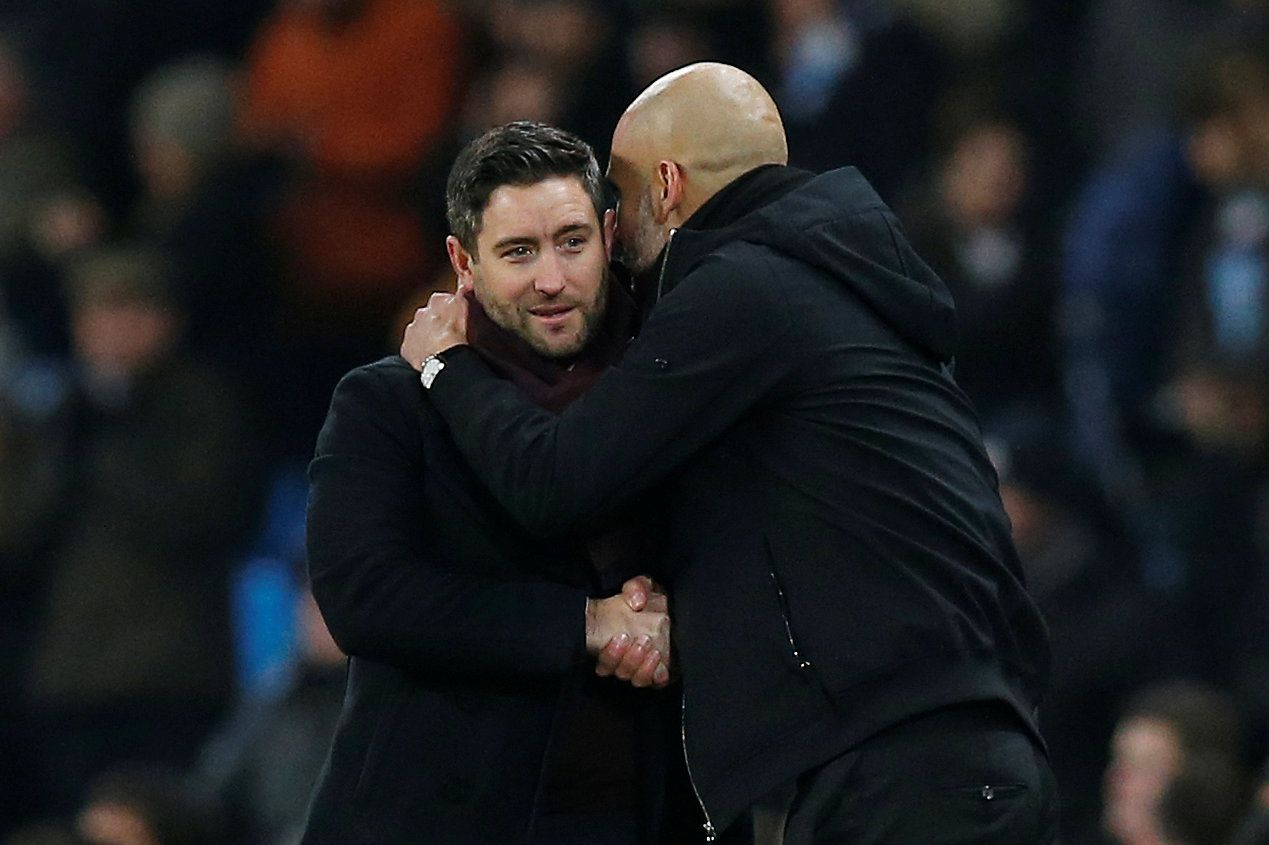 Soccer Football - Carabao Cup Semi Final First Leg - Manchester City vs Bristol City - Etihad Stadium, Manchester, Britain - January 9, 2018   Manchester City manager Pep Guardiola with Bristol City manager Lee Johnson after the match   REUTERS/Andrew Yates    EDITORIAL USE ONLY. No use with unauthorized audio, video, data, fixture lists, club/league logos or "live" services. Online in-match use limited to 75 images, no video emulation. No use in betting, games or single club/league/player publi