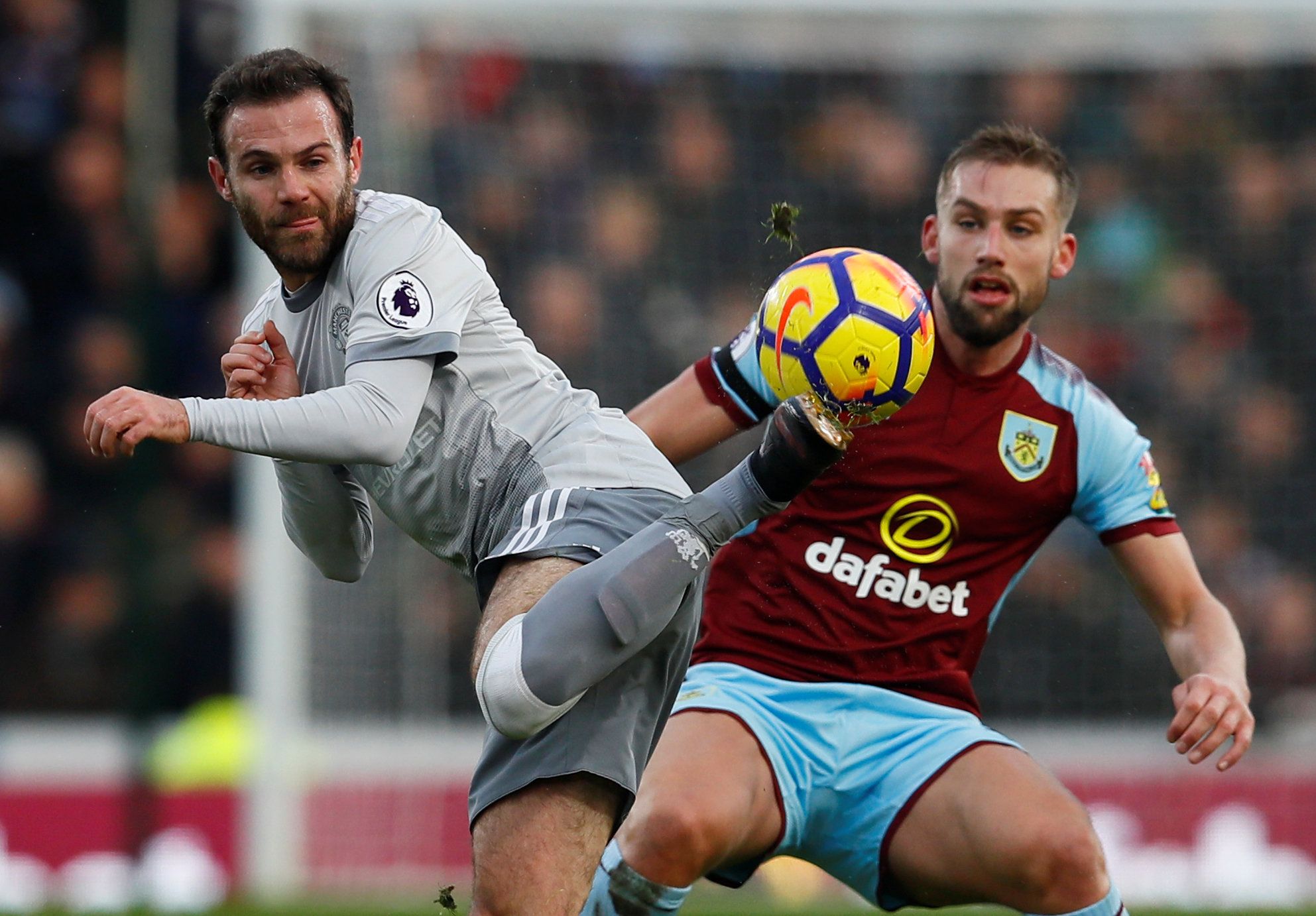 Soccer Football - Premier League - Burnley vs Manchester United - Turf Moor, Burnley, Britain - January 20, 2018   Manchester United's Juan Mata in action with Burnley's Charlie Taylor    Action Images via Reuters/Jason Cairnduff    EDITORIAL USE ONLY. No use with unauthorized audio, video, data, fixture lists, club/league logos or 
