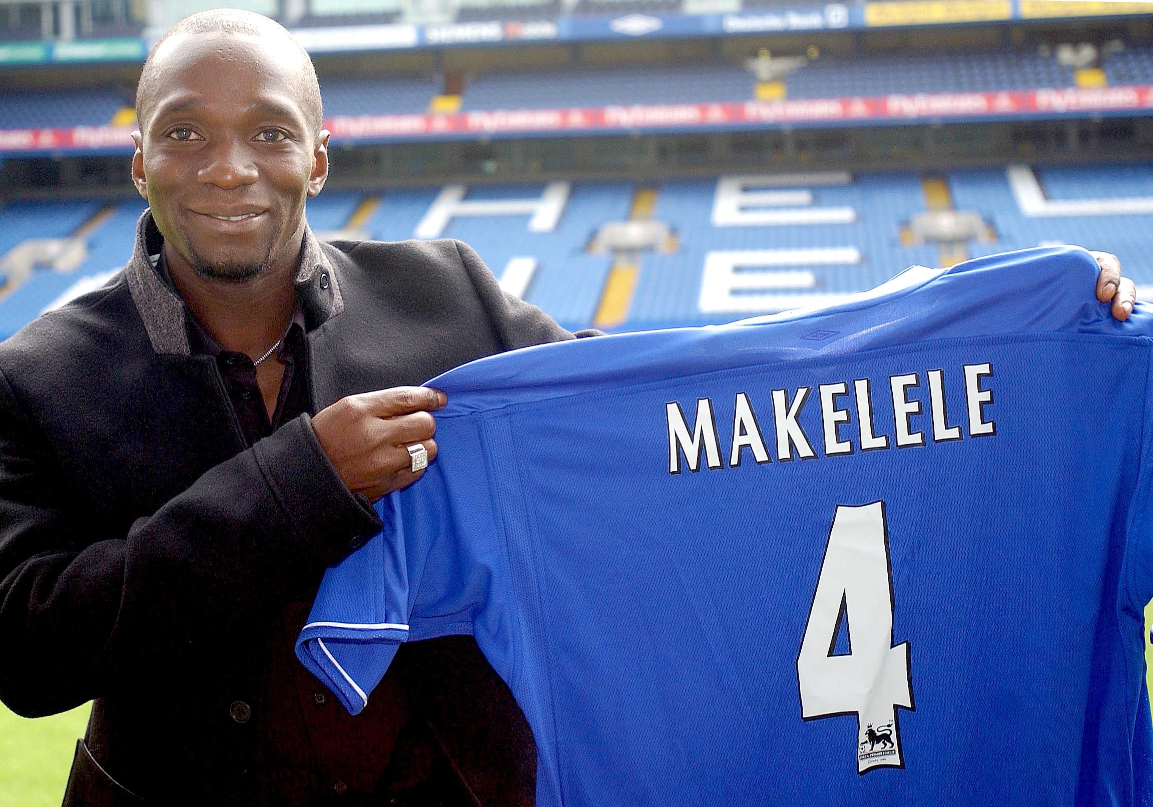 Chelsea Football Club's new French midfielder Claude Makelele holds his
new shirt at his unveiling at Stamford Bridge, London, September, 12,
2003. The French international was signed from Spanish club Real Madrid
for 16 million pounds ($25, 529, 600) as part of the massive cash
injection Chelsea's new Russian owner Roman Abramovich has given the
club. REUTERS/David Bebber

DB/MD/MA