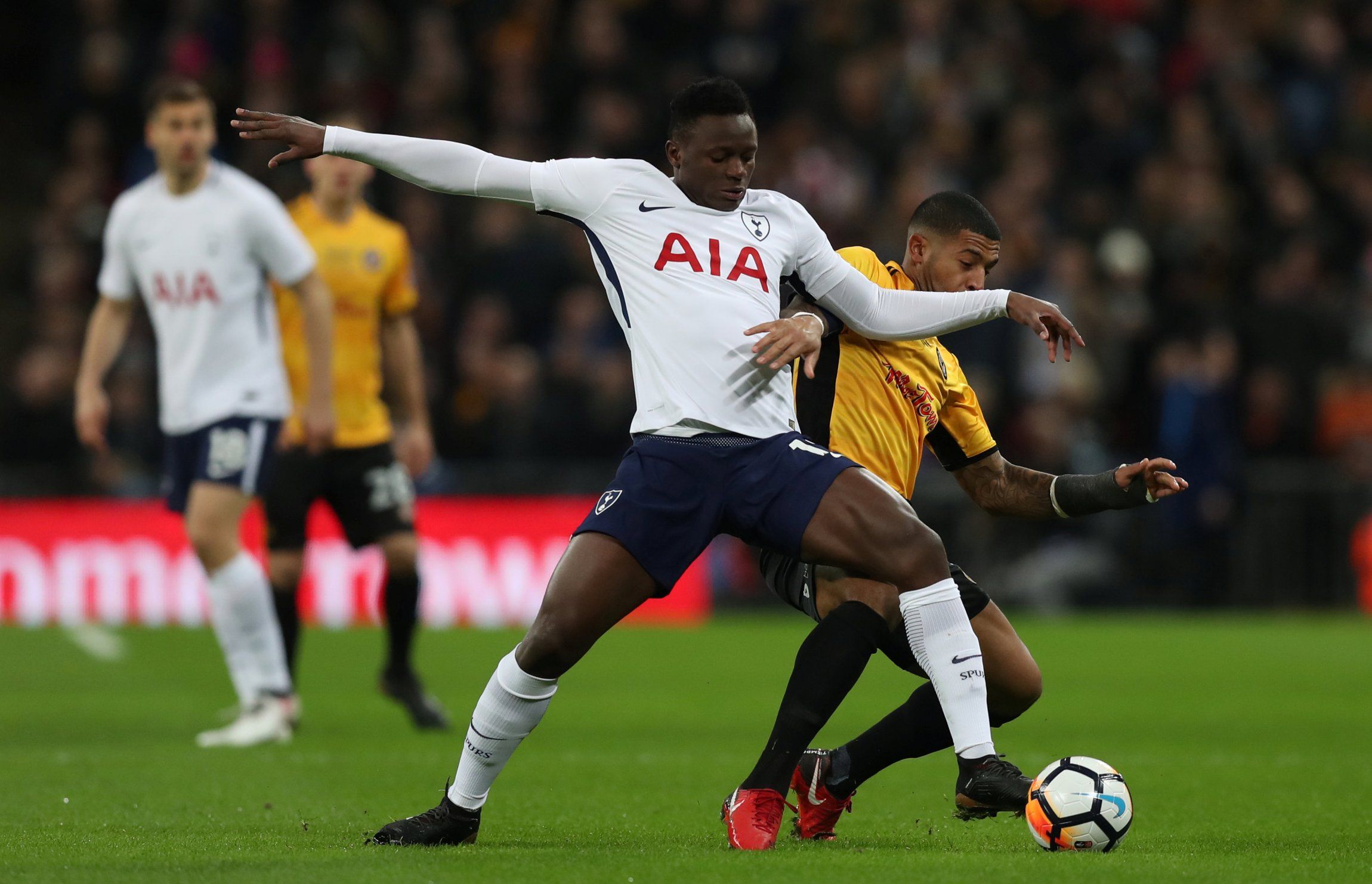 Victor Wanyama challenges for the ball