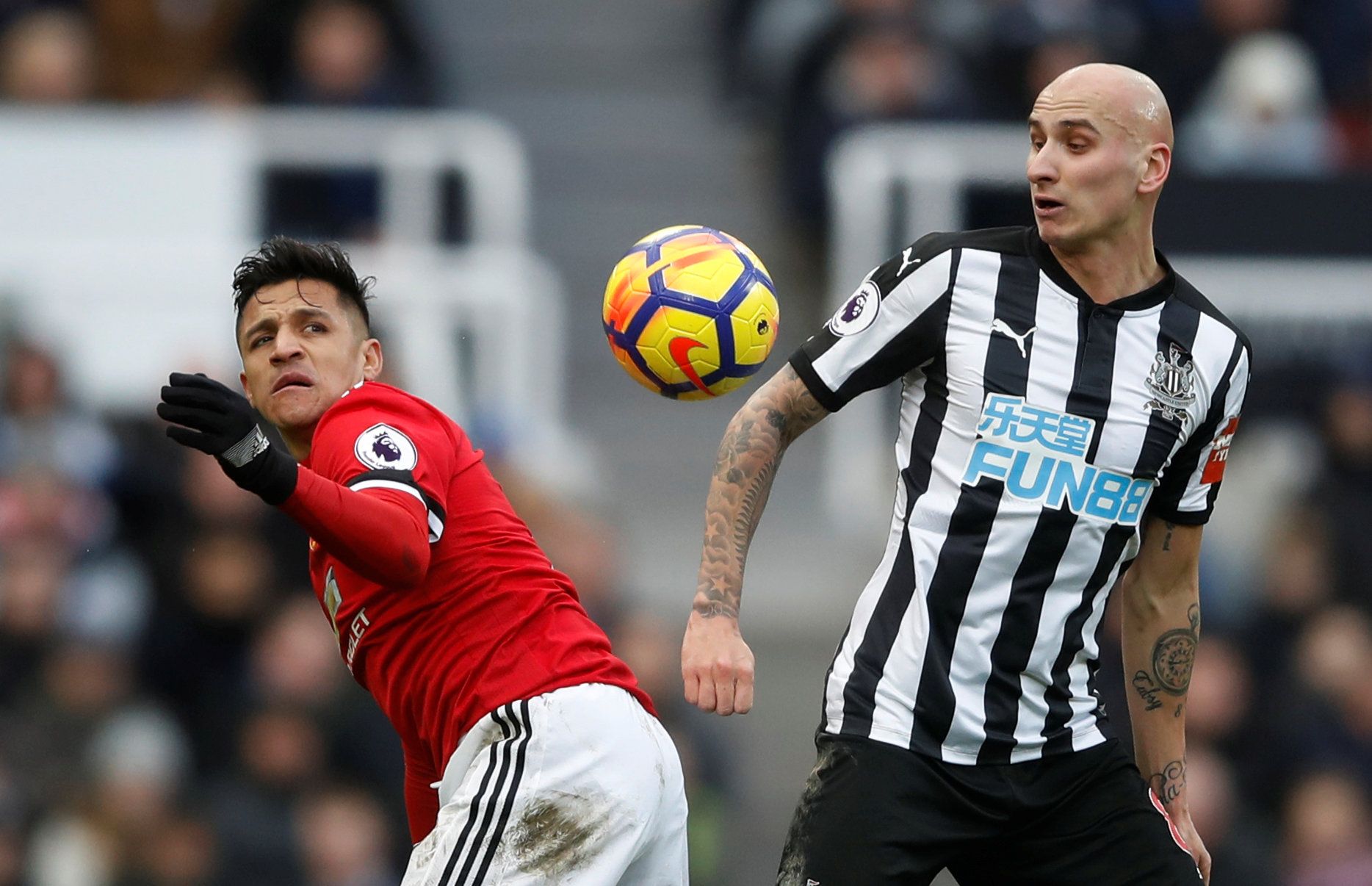 Soccer Football - Premier League - Newcastle United vs Manchester United - St James' Park, Newcastle, Britain - February 11, 2018   Manchester United’s Alexis Sanchez in action with Newcastle United's Jonjo Shelvey    Action Images via Reuters/Carl Recine    EDITORIAL USE ONLY. No use with unauthorized audio, video, data, fixture lists, club/league logos or 