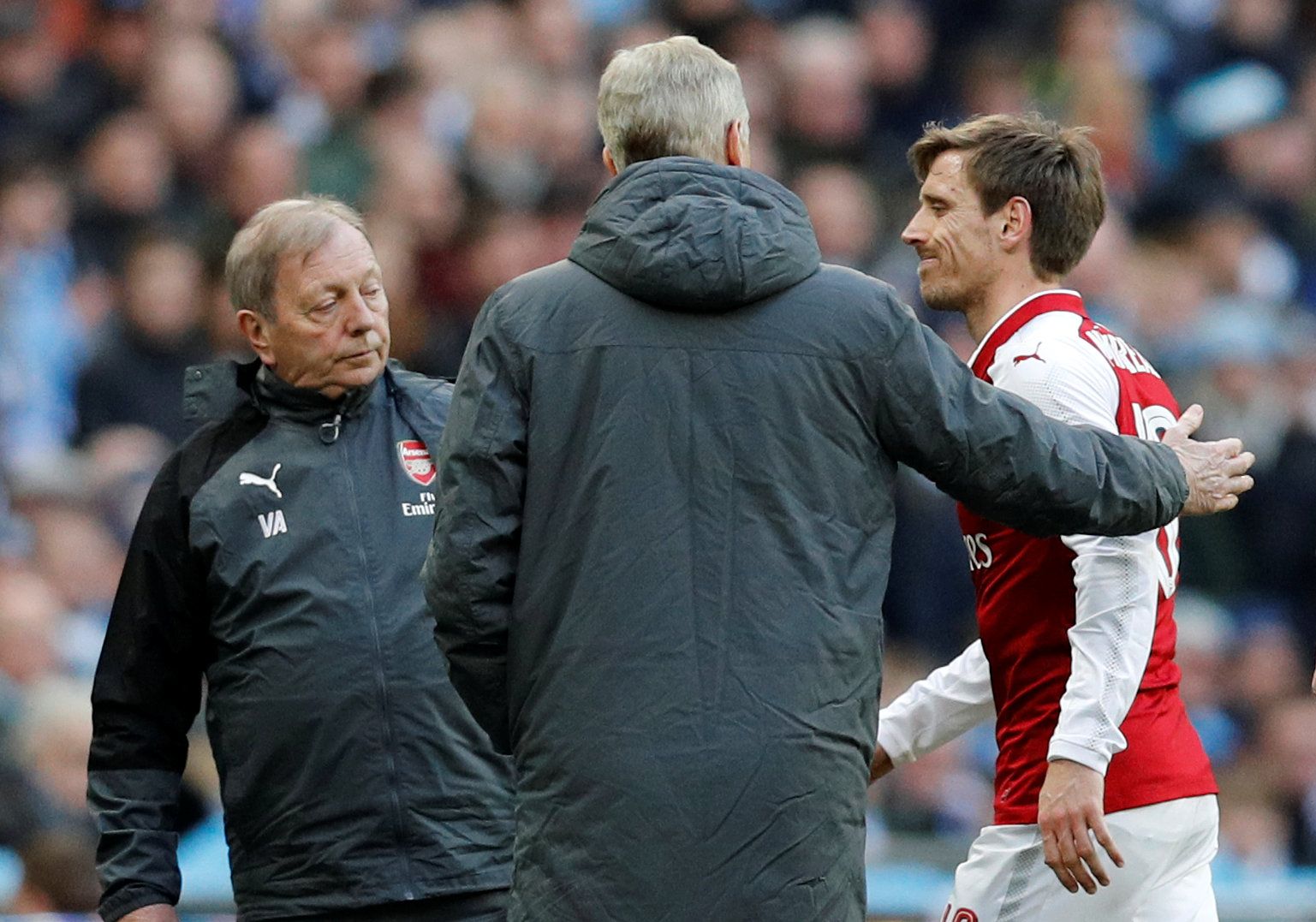 Soccer Football - Carabao Cup Final - Arsenal vs Manchester City - Wembley Stadium, London, Britain - February 25, 2018   Arsenal manager Arsene Wenger consoles Nacho Monreal as he leaves the pitch after sustaining an injury    REUTERS/Darren Staples     EDITORIAL USE ONLY. No use with unauthorized audio, video, data, fixture lists, club/league logos or 