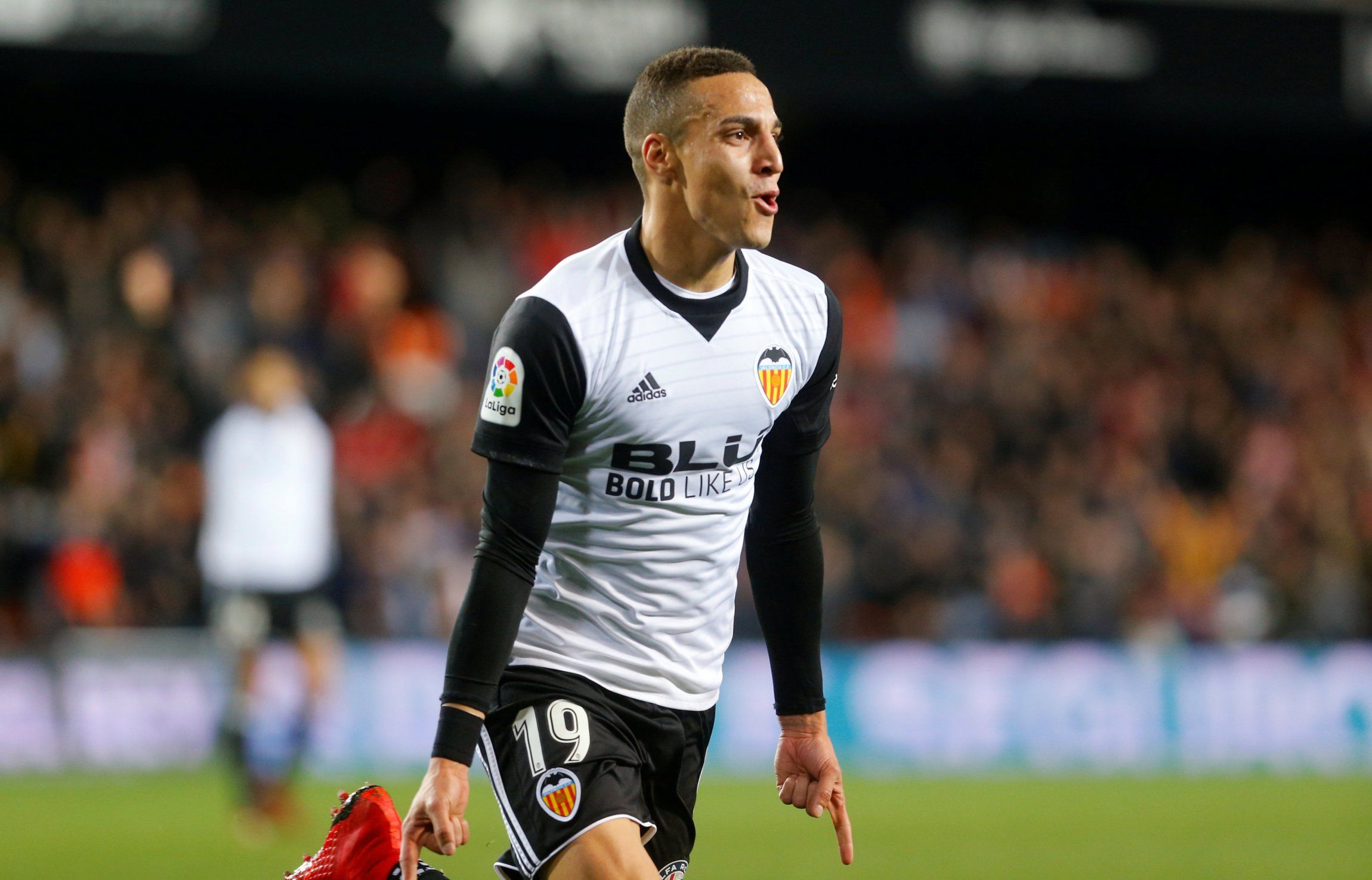 Valencia striker Rodrigo celebrates a goal