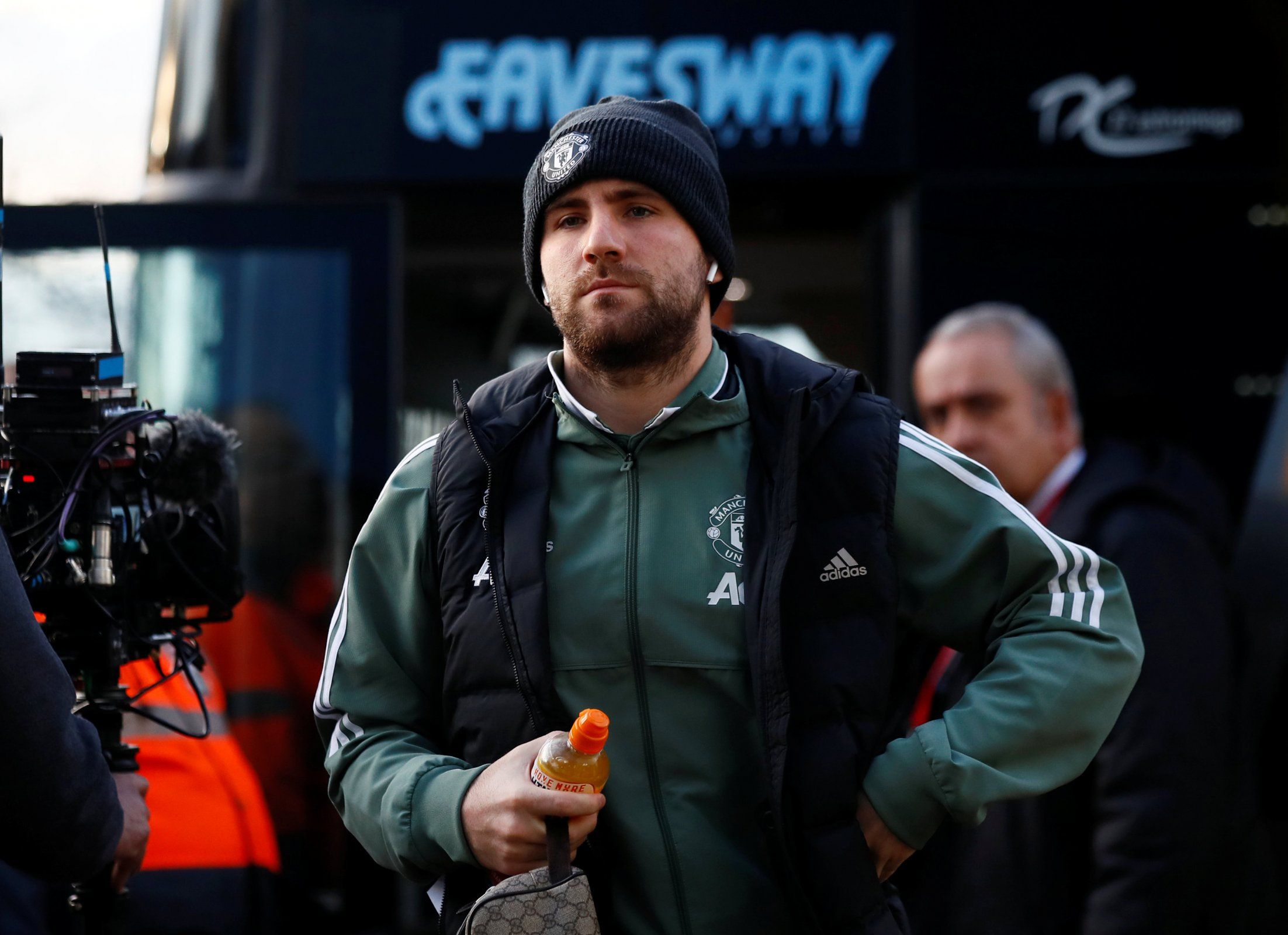 Luke Shaw steps off the Manchester United team bus