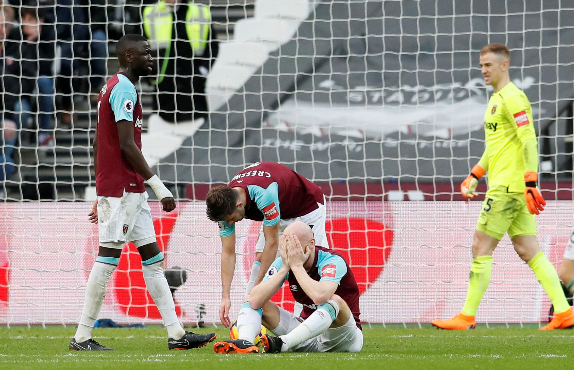 Soccer Football - Premier League - West Ham United vs Burnley - London Stadium, London, Britain - March 10, 2018   West Ham United's James Collins and Cheikhou Kouyate look dejected after a Burnley goal   REUTERS/David Klein    EDITORIAL USE ONLY. No use with unauthorized audio, video, data, fixture lists, club/league logos or "live" services. Online in-match use limited to 75 images, no video emulation. No use in betting, games or single club/league/player publications.  Please contact your acc