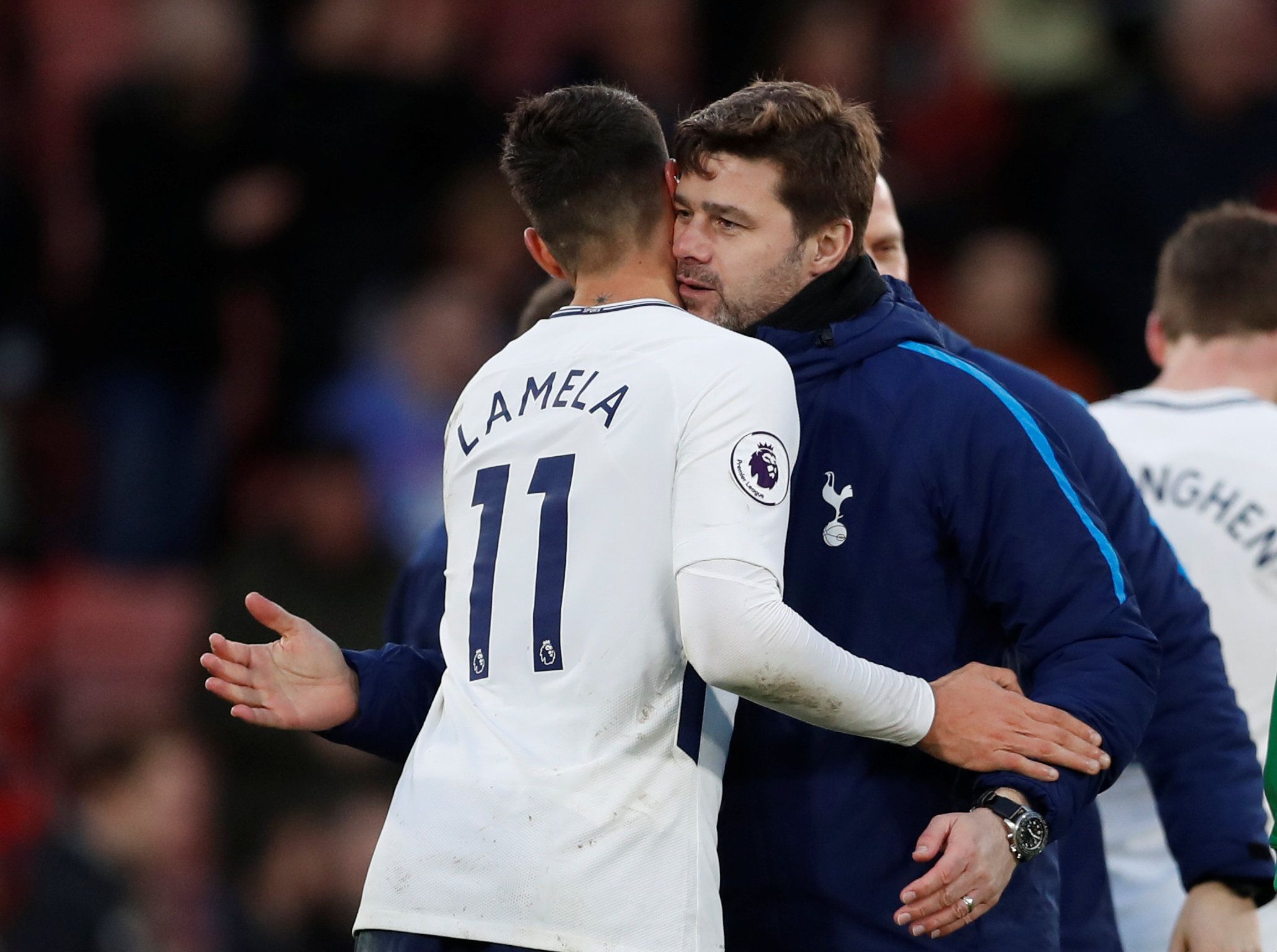 Soccer Football - Premier League - AFC Bournemouth vs Tottenham Hotspur - Vitality Stadium, Bournemouth, Britain - March 11, 2018   Tottenham manager Mauricio Pochettino celebrates after the match with Erik Lamela    Action Images via Reuters/Matthew Childs    EDITORIAL USE ONLY. No use with unauthorized audio, video, data, fixture lists, club/league logos or "live" services. Online in-match use limited to 75 images, no video emulation. No use in betting, games or single club/league/player publi