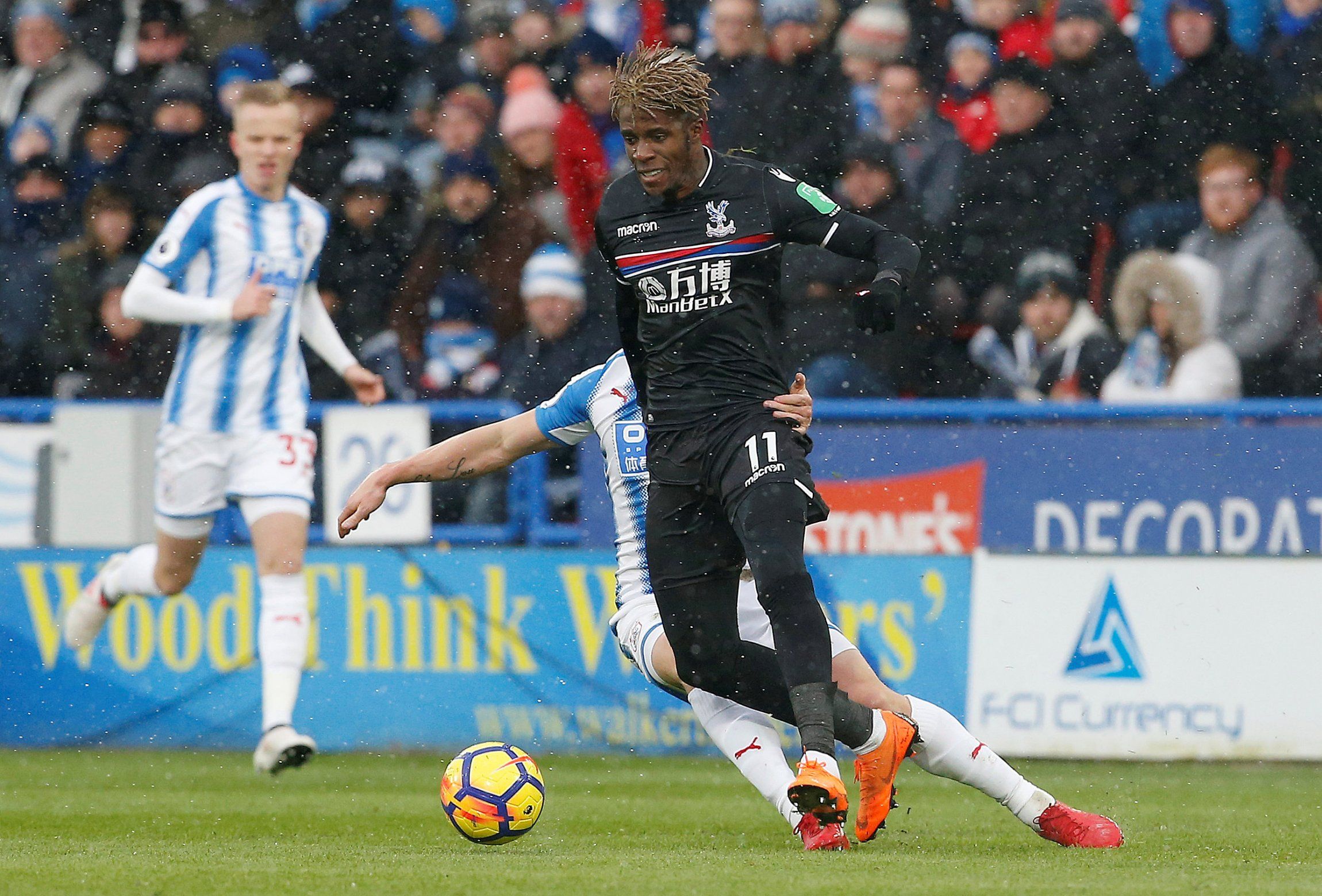 Crystal Palace winger Wilfried Zaha in action