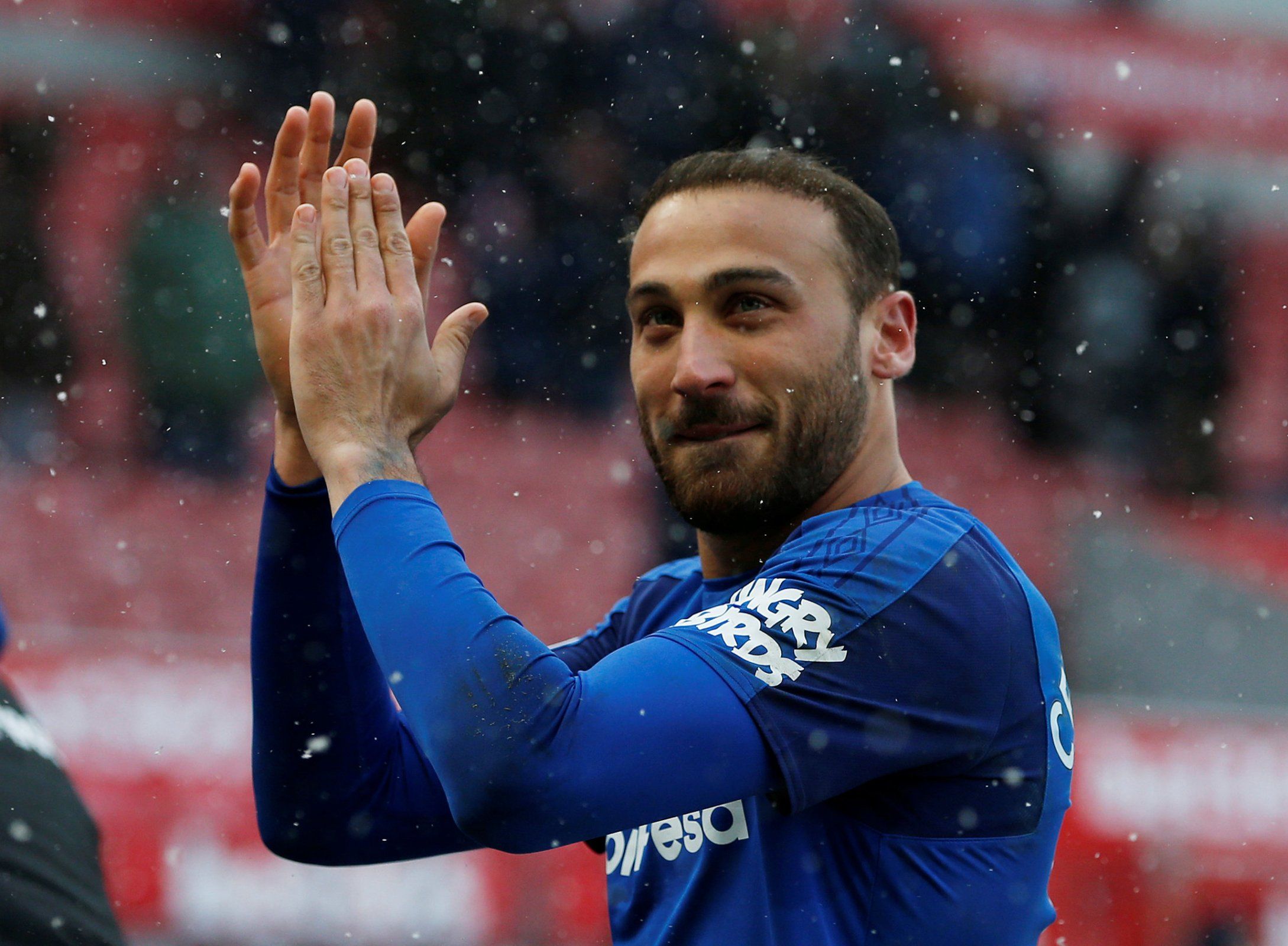Cenk Tosun applauds the Everton fans following the team's win over Stoke City
