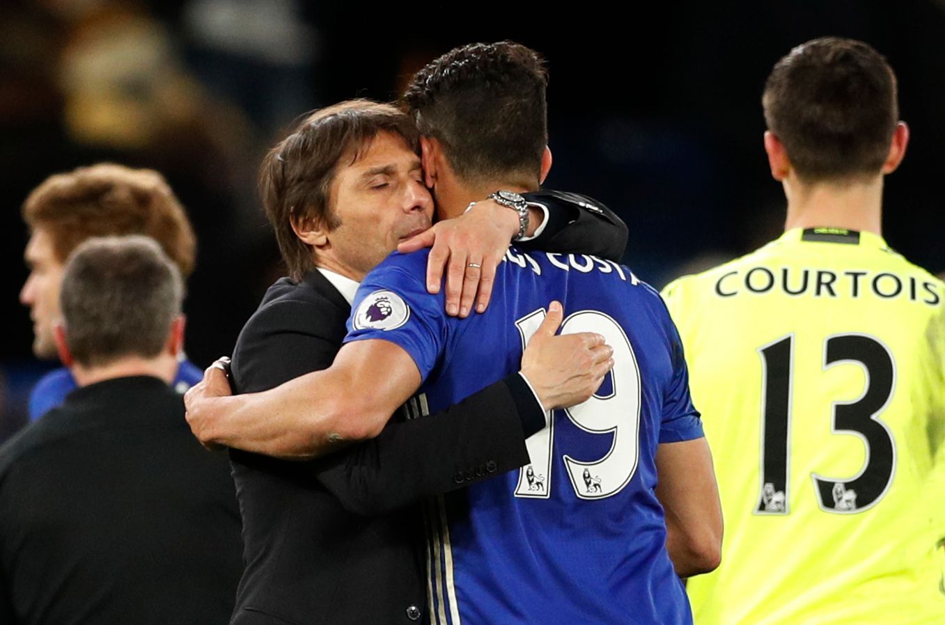 Antonio Conte hugs Diego Costa