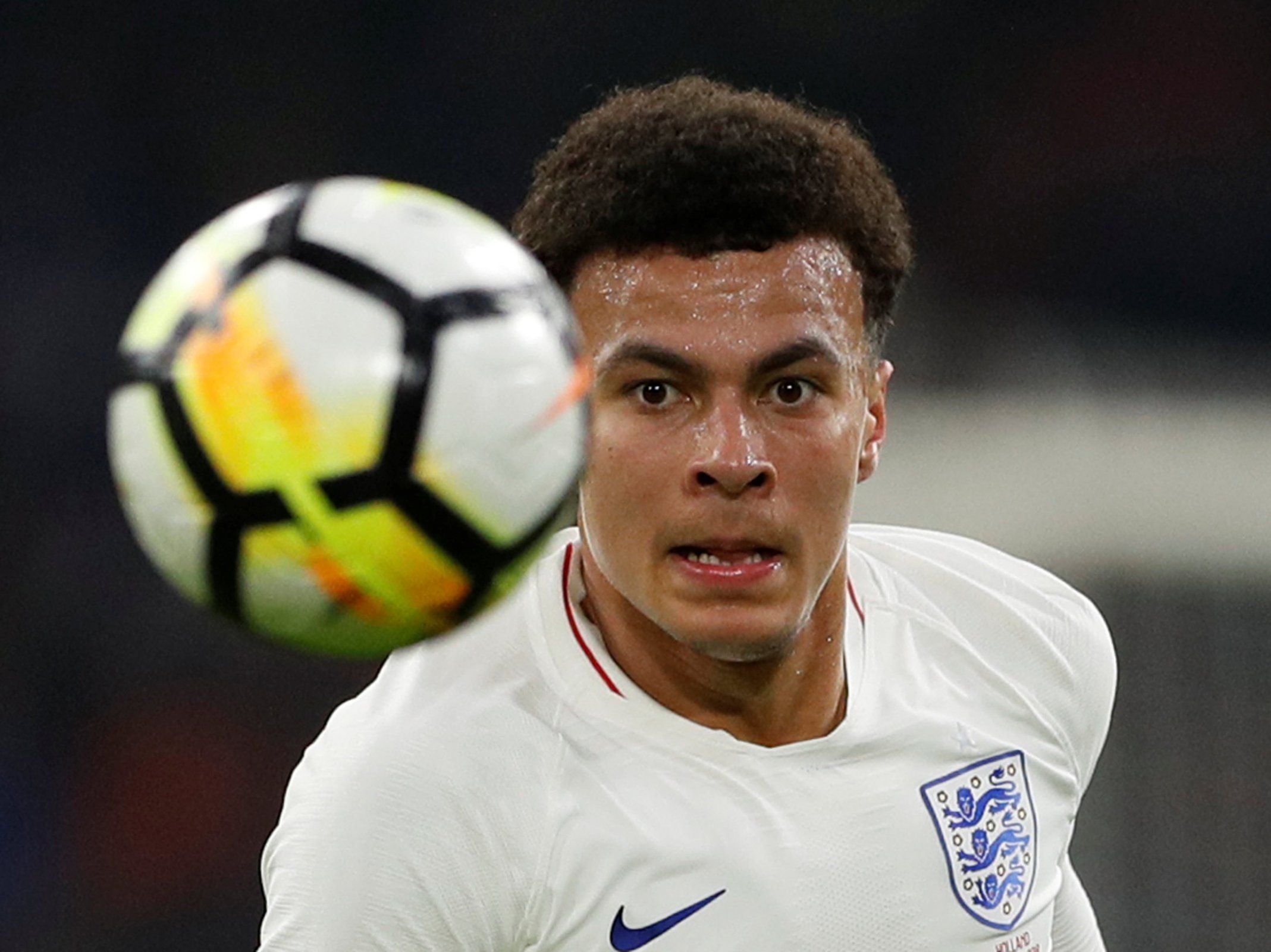 Dele Alli hunts down the ball for England