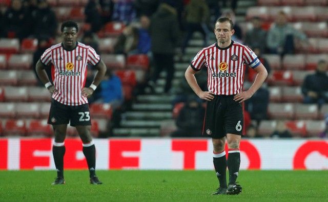 Soccer Football - Championship - Sunderland vs Aston Villa - Stadium of Light, Sunderland, Britain - March 6, 2018  Sunderland's Lamine Kone (L) and Lee Cattermole look dejected   Action Images/Craig Brough  EDITORIAL USE ONLY. No use with unauthorized audio, video, data, fixture lists, club/league logos or 