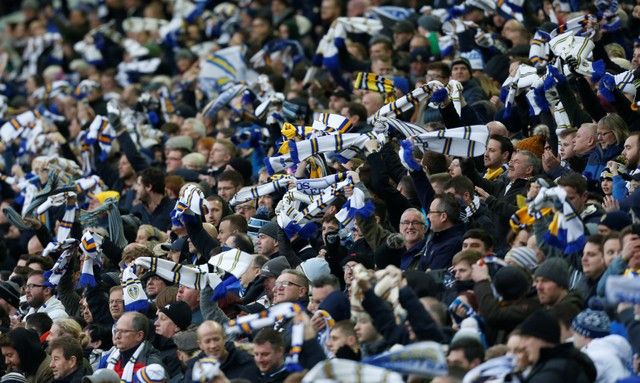 Soccer Football - Championship - Leeds United vs Hull City - Elland Road, Leeds, Britain - December 23, 2017  Leeds United fans hold up their scarves  Action Images/Ed Sykes  EDITORIAL USE ONLY. No use with unauthorized audio, video, data, fixture lists, club/league logos or 