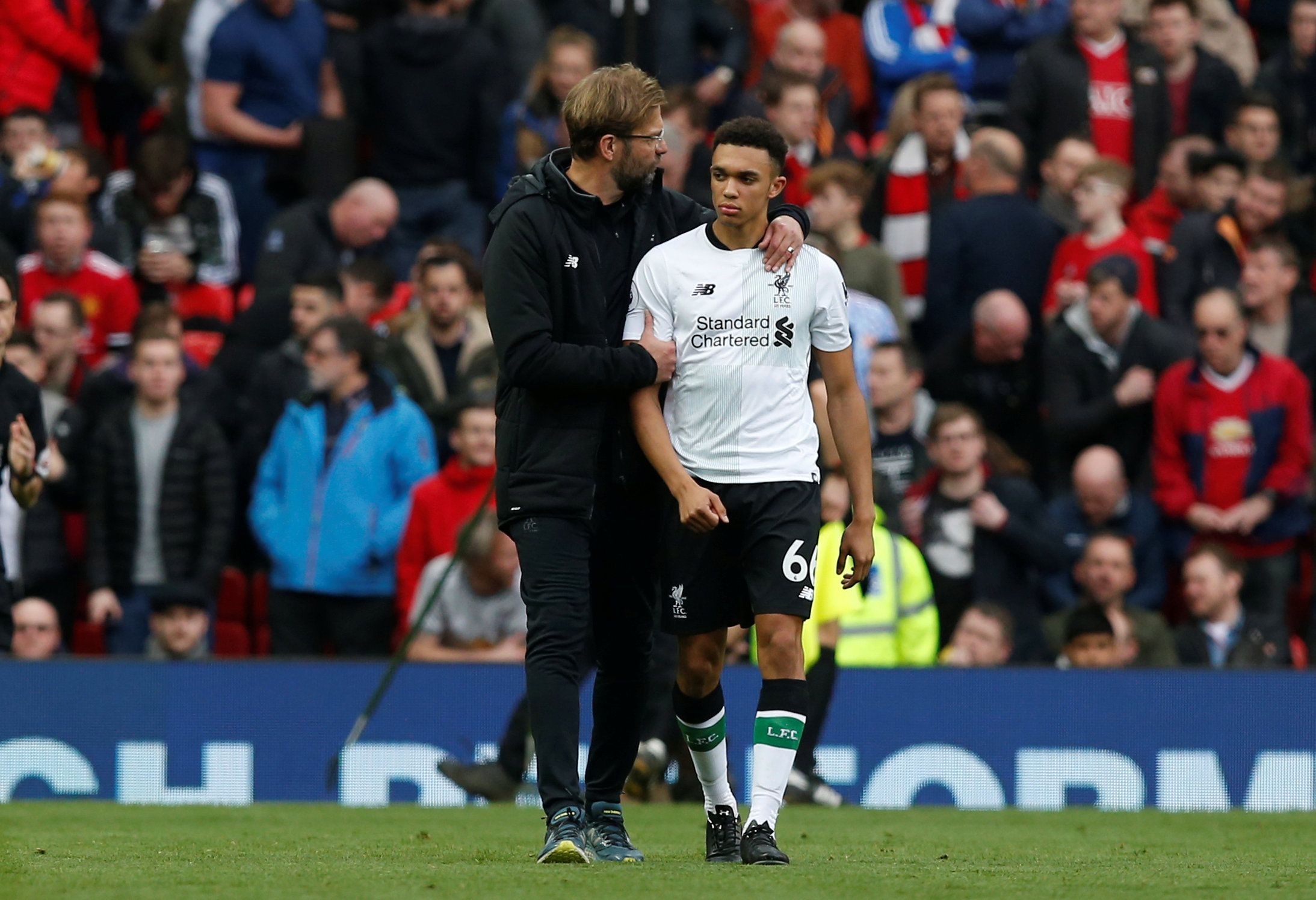 Soccer Football - Premier League - Manchester United vs Liverpool - Old Trafford, Manchester, Britain - March 10, 2018   Liverpool manager Juergen Klopp with Trent Alexander-Arnold    REUTERS/Andrew Yates    EDITORIAL USE ONLY. No use with unauthorized audio, video, data, fixture lists, club/league logos or 