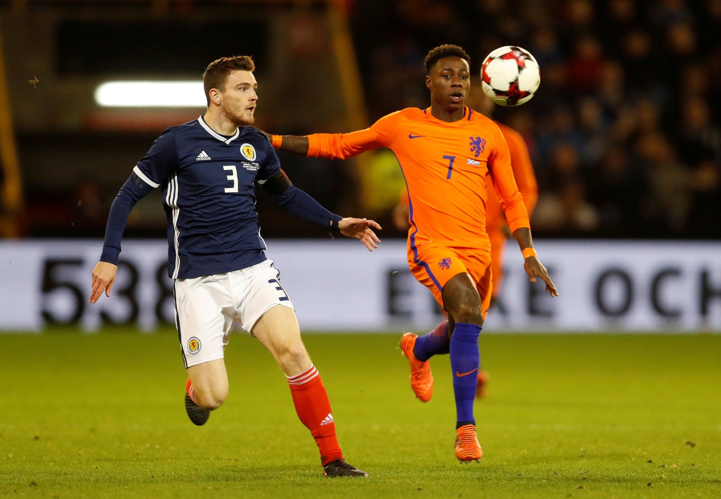 Liverpool's Andy Robertson in action for Scotland