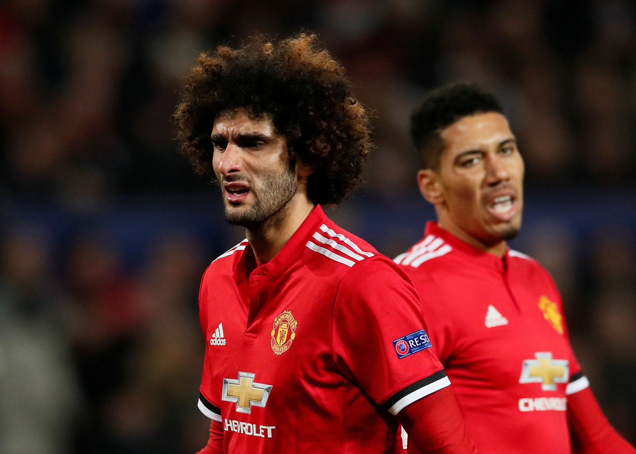 Soccer Football - Champions League Round of 16 Second Leg - Manchester United vs Sevilla - Old Trafford, Manchester, Britain - March 13, 2018   Manchester United's Marouane Fellaini and Chris Smalling       REUTERS/David Klein