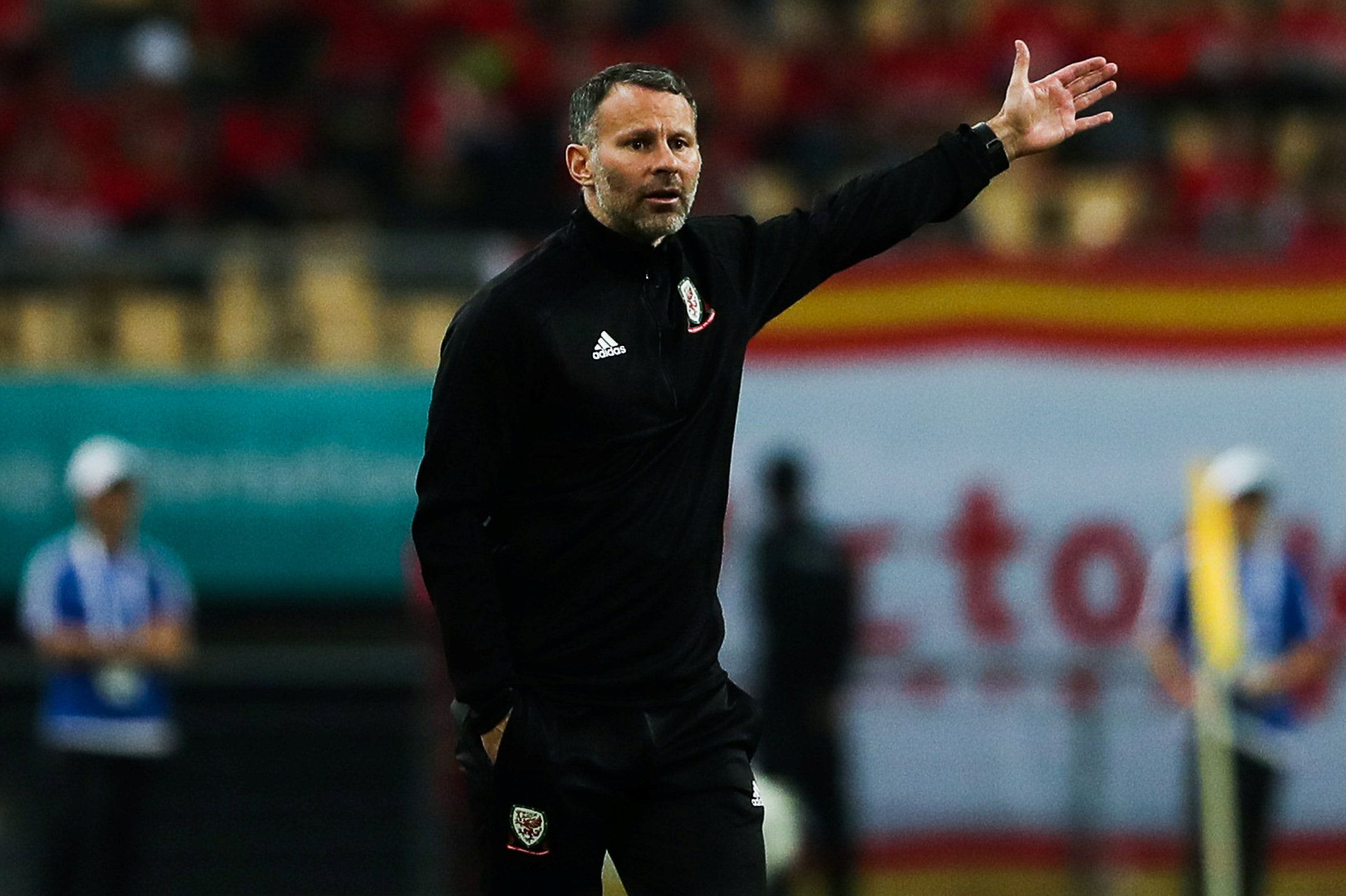 Football Soccer - China v Wales - China Cup Semi-Finals - Guangxi Sports Center, Nanning, China - March 22, 2018. Wales manager Ryan Giggs reacts. REUTERS/Stringer ATTENTION EDITORS - THIS IMAGE WAS PROVIDED BY A THIRD PARTY. CHINA OUT.