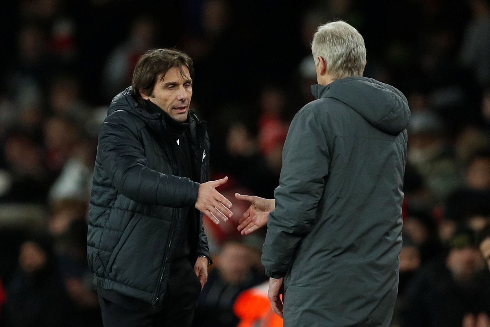 Soccer Football - Premier League - Arsenal vs Chelsea - Emirates Stadium, London, Britain - January 3, 2018   Chelsea manager Antonio Conte shakes hands with Arsenal manager Arsene Wenger after the match    Action Images via Reuters/John Sibley    EDITORIAL USE ONLY. No use with unauthorized audio, video, data, fixture lists, club/league logos or 