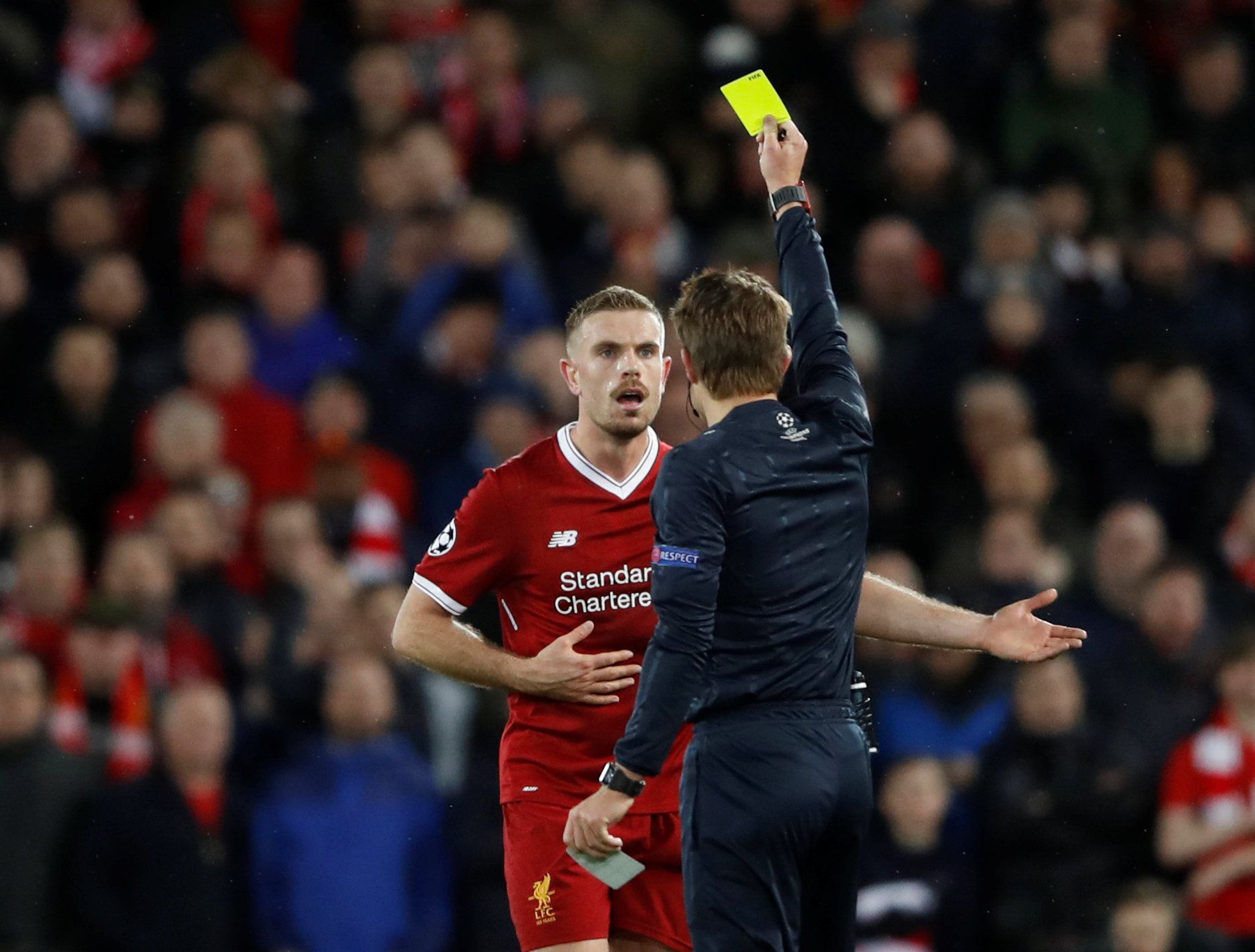 Soccer Football - Champions League Quarter Final First Leg - Liverpool vs Manchester City - Anfield, Liverpool, Britain - April 4, 2018   Liverpool's Jordan Henderson is shown a yellow card by referee Felix Brych    Action Images via Reuters/Carl Recine