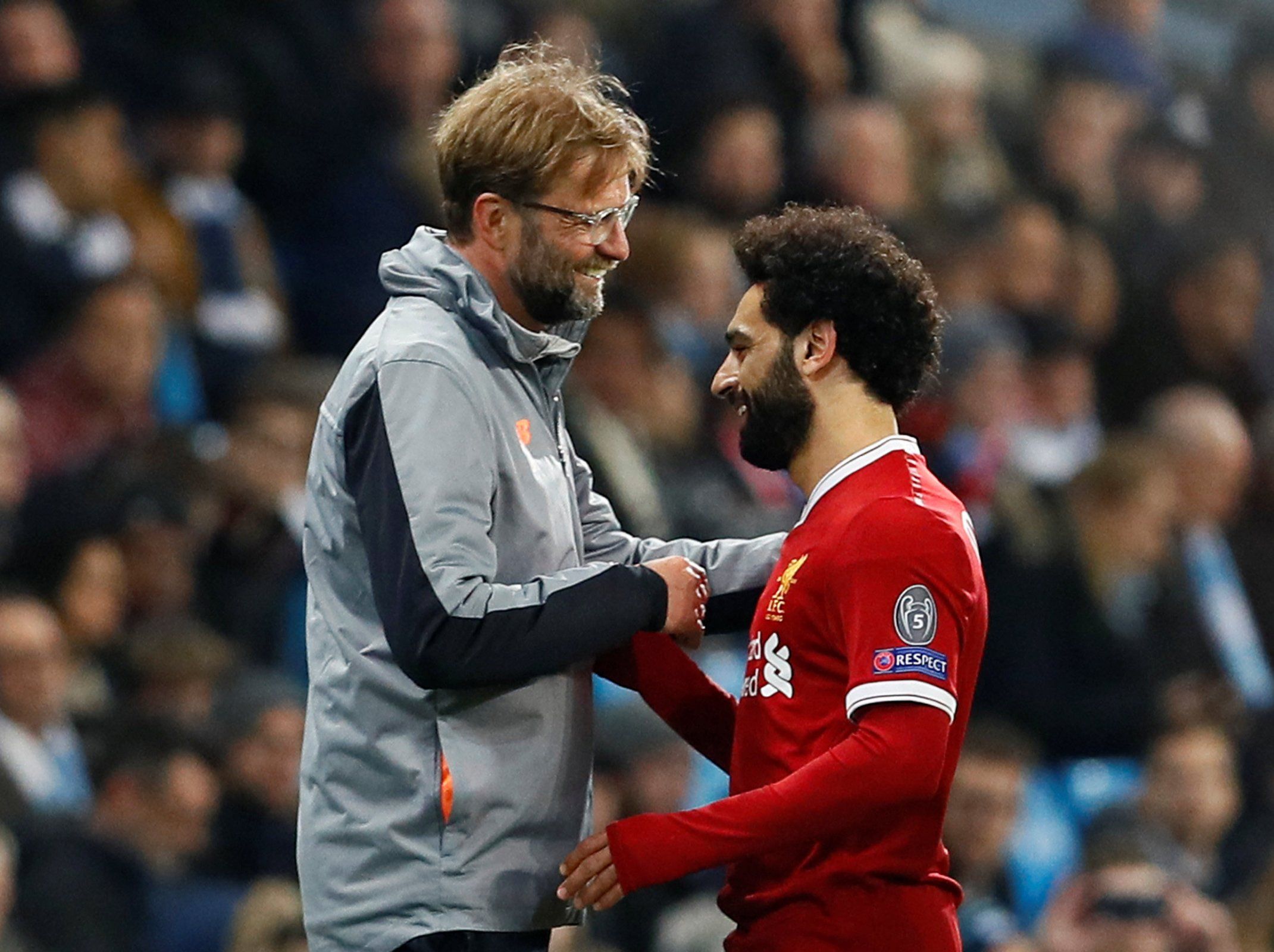 Liverpool manager Jurgen Klopp greets Mohamed Salah