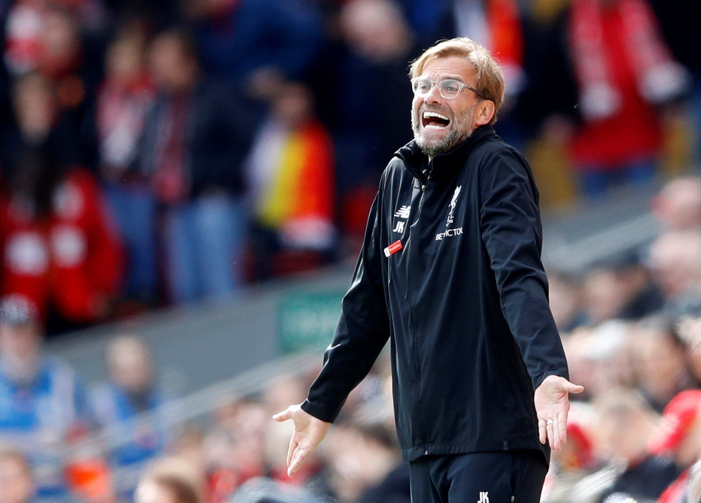 Jurgen Klopp gestures on the touchline during Liverpool's match against Stoke City