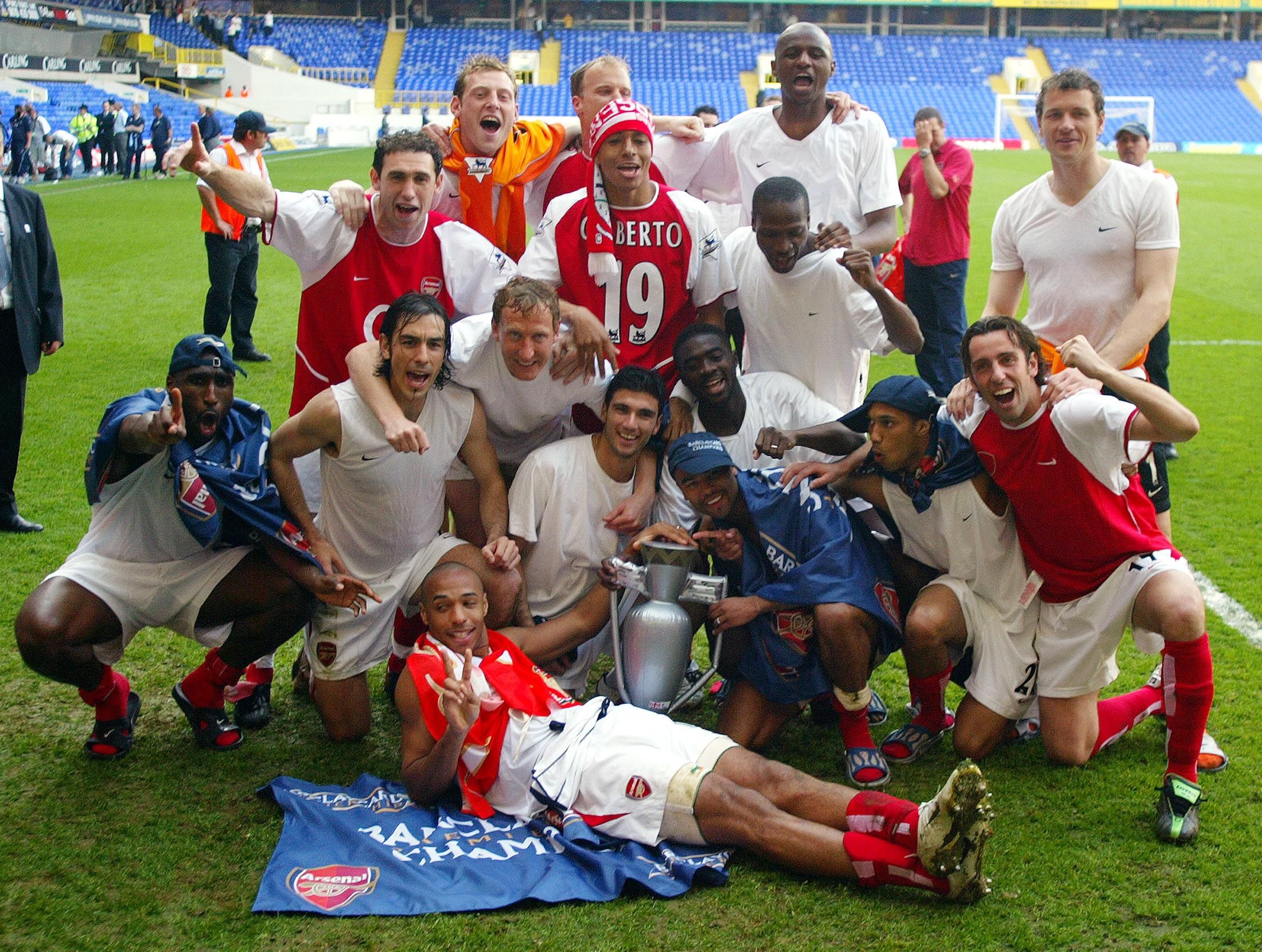 Arsenal celebrate winning the Premier League title in 2003/04