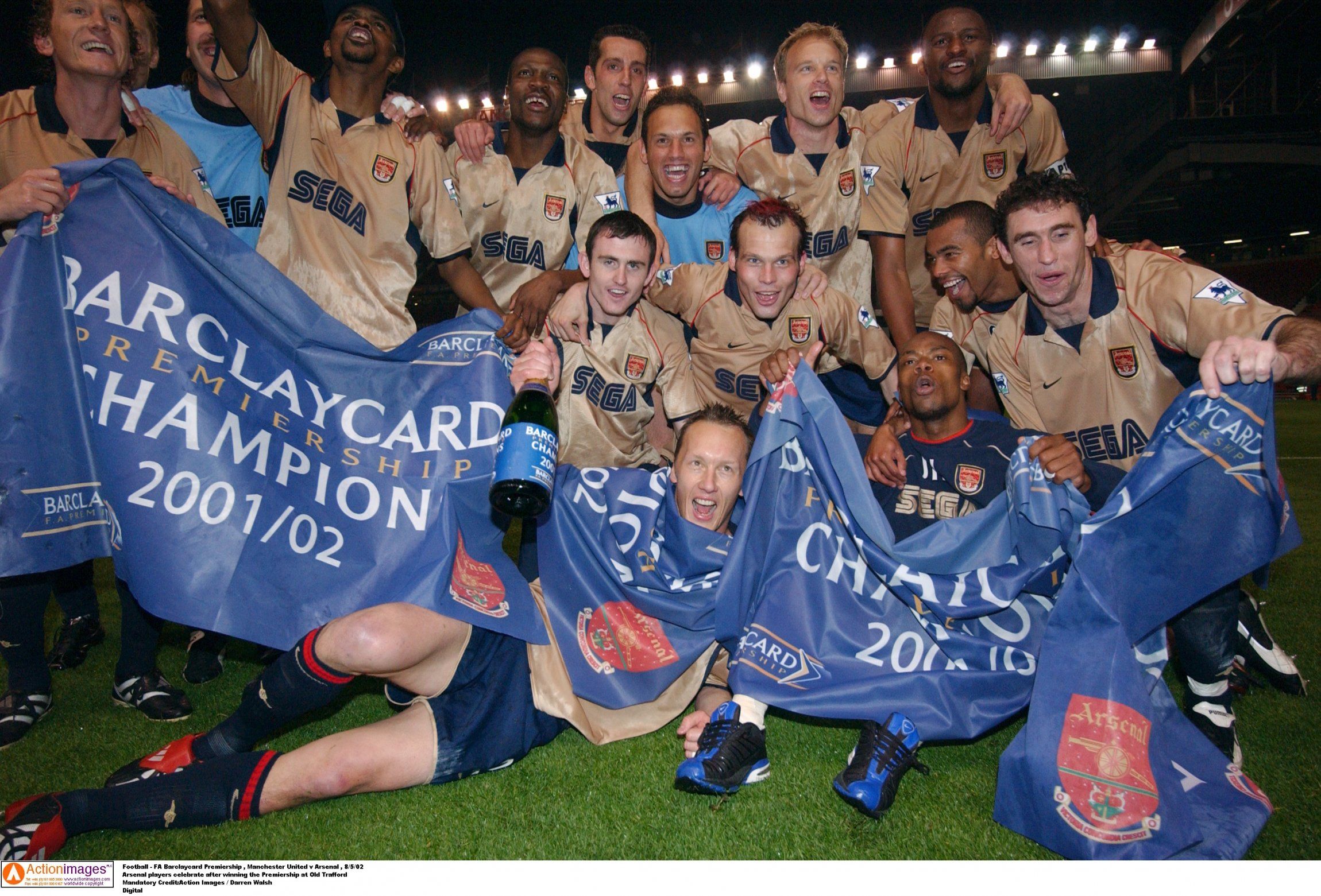 Arsenal celebrate winning the title at Old Trafford