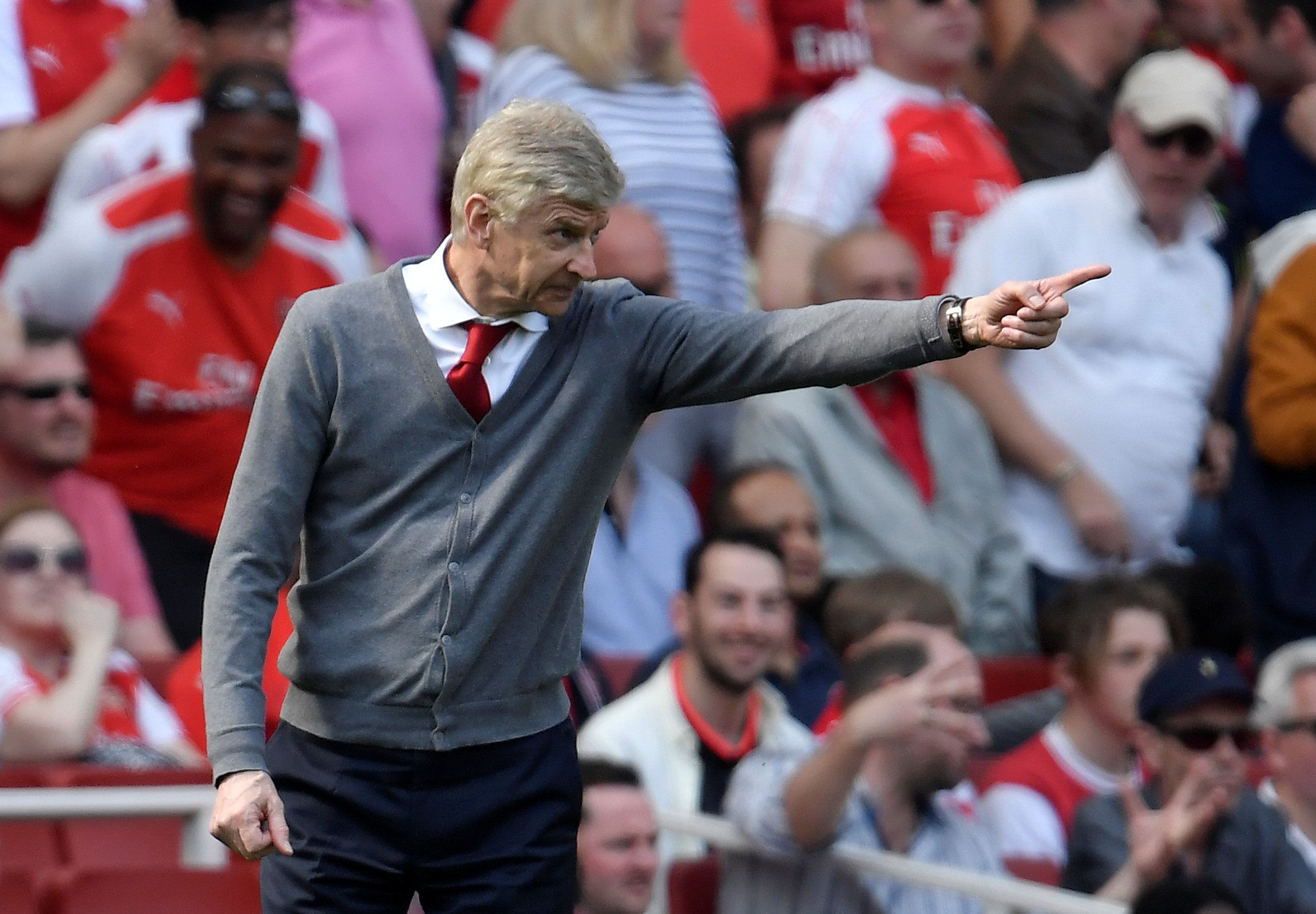 Arsene Wenger hands out instructions from the sidelines