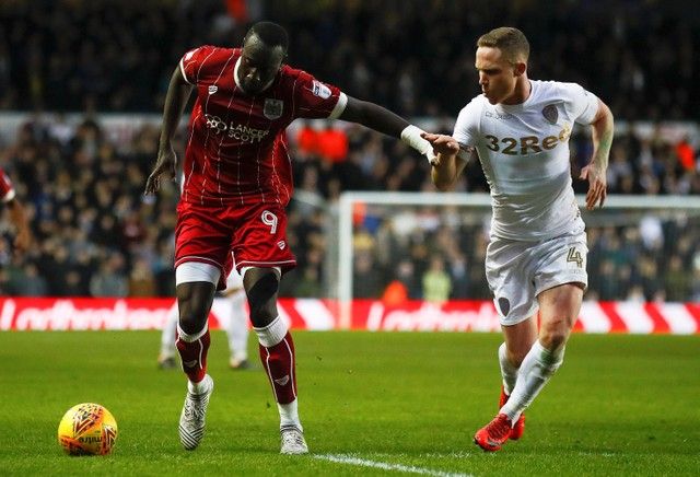 Soccer Football - Championship - Leeds United vs Bristol City - Elland Road, Leeds, Britain - February 18, 2018  Bristol City's Famara Diedhiou in action with Leeds United's Adam Forshaw  Action Images/Jason Cairnduff  EDITORIAL USE ONLY. No use with unauthorized audio, video, data, fixture lists, club/league logos or 