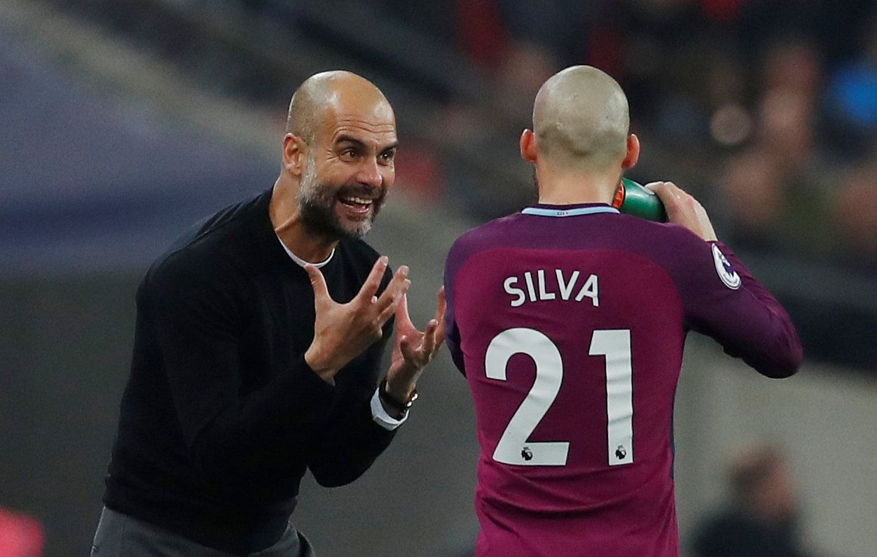 Guardiola gives instructions to David Silva