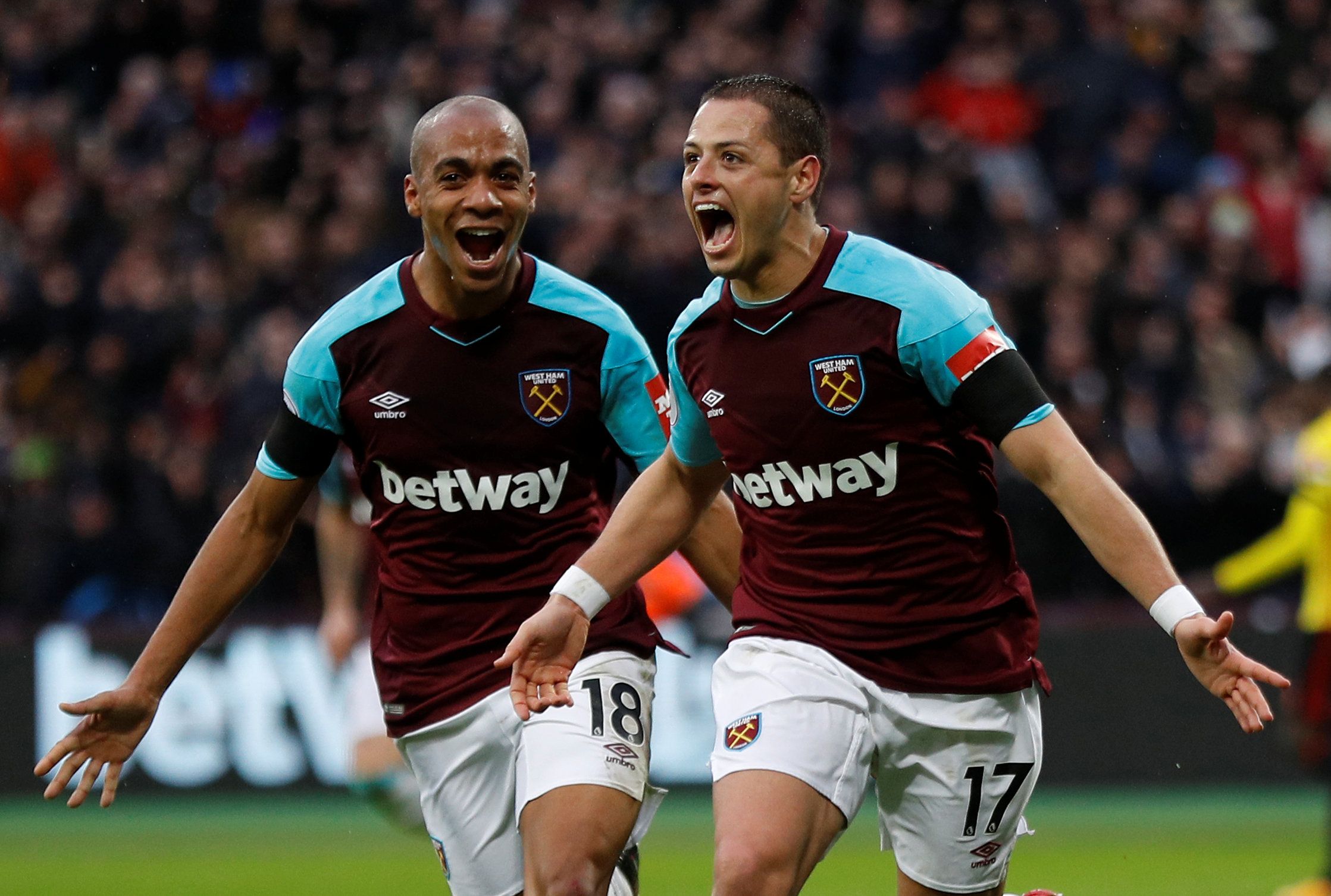 Soccer Football - Premier League - West Ham United vs Watford - London Stadium, London, Britain - February 10, 2018   West Ham United's Javier Hernandez celebrates scoring their first goal with Joao Mario   REUTERS/Peter Nicholls    EDITORIAL USE ONLY. No use with unauthorized audio, video, data, fixture lists, club/league logos or 