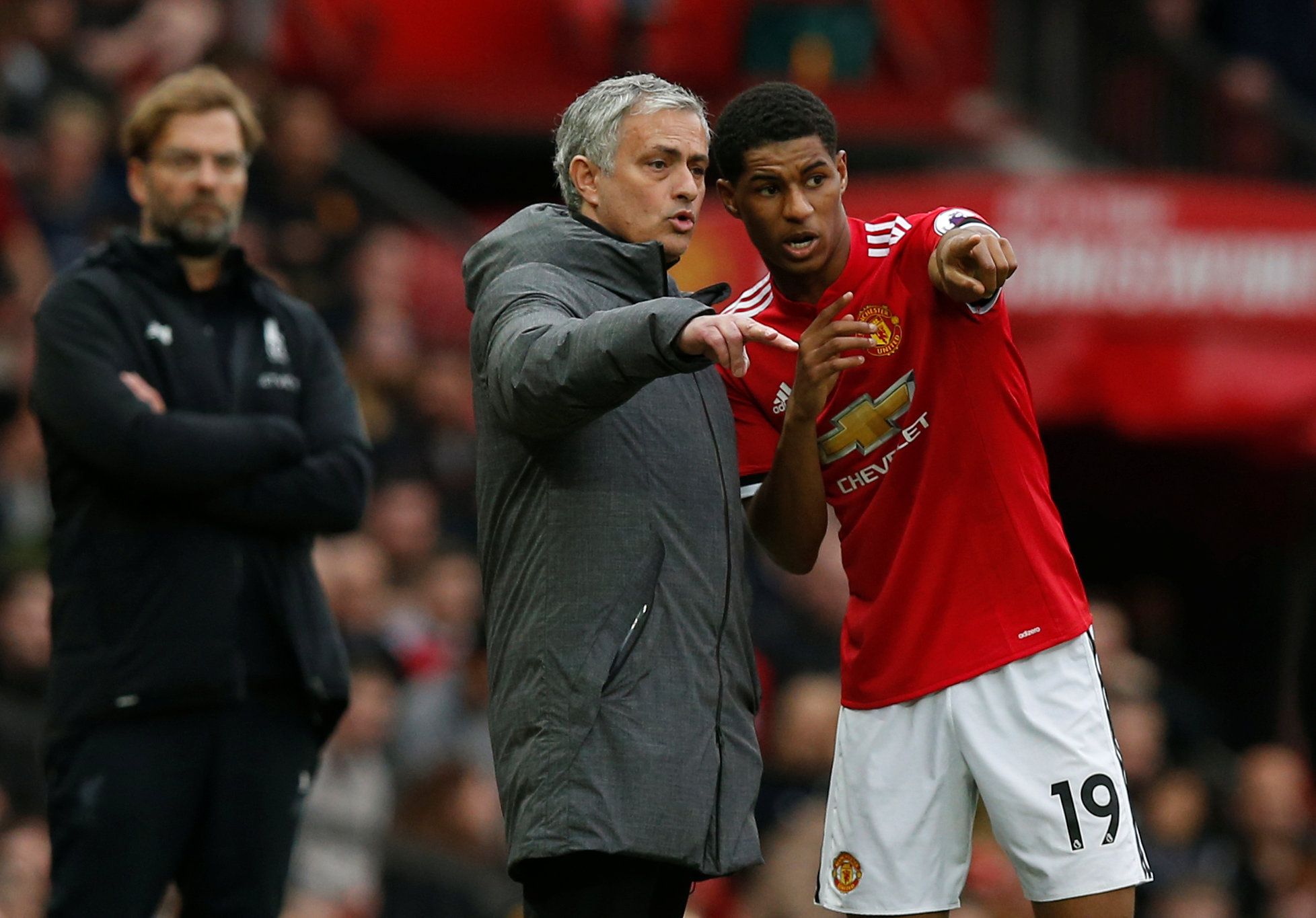 Jose Mourinho and Marcus Rashford in discussion