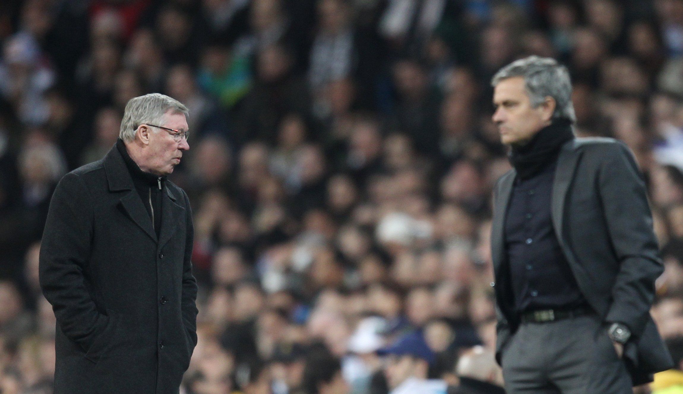 Jose Mourinho and Sir Alex Ferguson look beyond each other