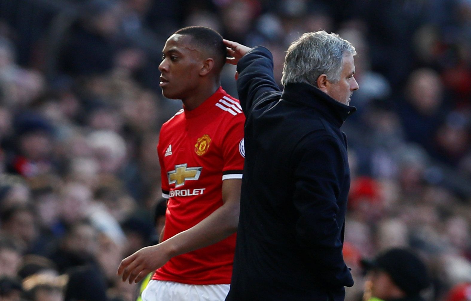 Soccer Football - Premier League - Manchester United vs Chelsea - Old Trafford, Manchester, Britain - February 25, 2018   Manchester United's Anthony Martial walks past manager Jose Mourinho as he is substituted    Action Images via Reuters/Jason Cairnduff    EDITORIAL USE ONLY. No use with unauthorized audio, video, data, fixture lists, club/league logos or 