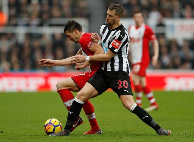 Soccer Football - Premier League - Newcastle United vs Southampton - St James' Park, Newcastle, Britain - March 10, 2018   Newcastle United's Florian Lejeune in action with Southampton's Dusan Tadic   Action Images via Reuters/Lee Smith    EDITORIAL USE ONLY. No use with unauthorized audio, video, data, fixture lists, club/league logos or 