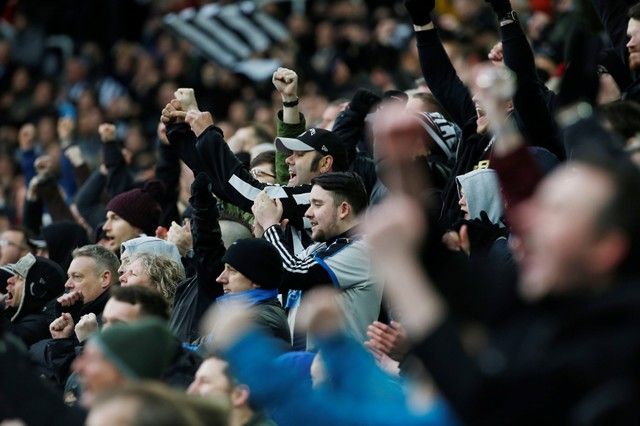 Soccer Football - Premier League - Newcastle United vs Huddersfield Town - St James' Park, Newcastle, Britain - March 31, 2018   Newcastle United fans celebrate at the end of the match    Action Images via Reuters/Craig Brough    EDITORIAL USE ONLY. No use with unauthorized audio, video, data, fixture lists, club/league logos or 