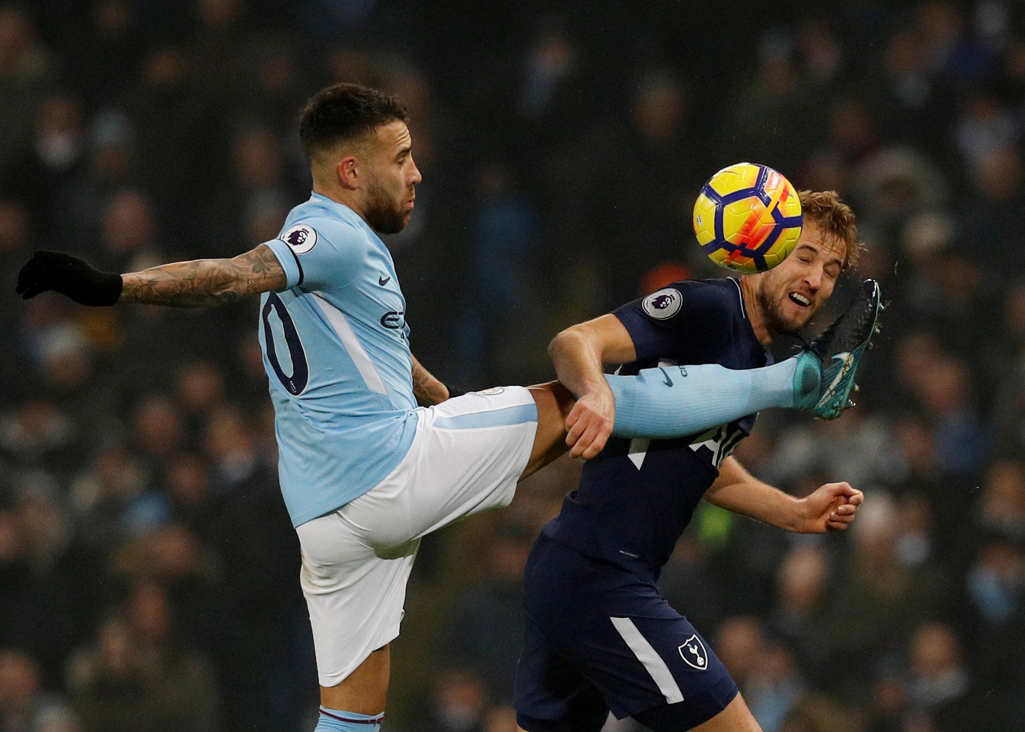 Soccer Football - Premier League - Manchester City vs Tottenham Hotspur - Etihad Stadium, Manchester, Britain - December 16, 2017   Manchester City's Nicolas Otamendi in action with Tottenham's Harry Kane    REUTERS/Phil Noble    EDITORIAL USE ONLY. No use with unauthorized audio, video, data, fixture lists, club/league logos or 