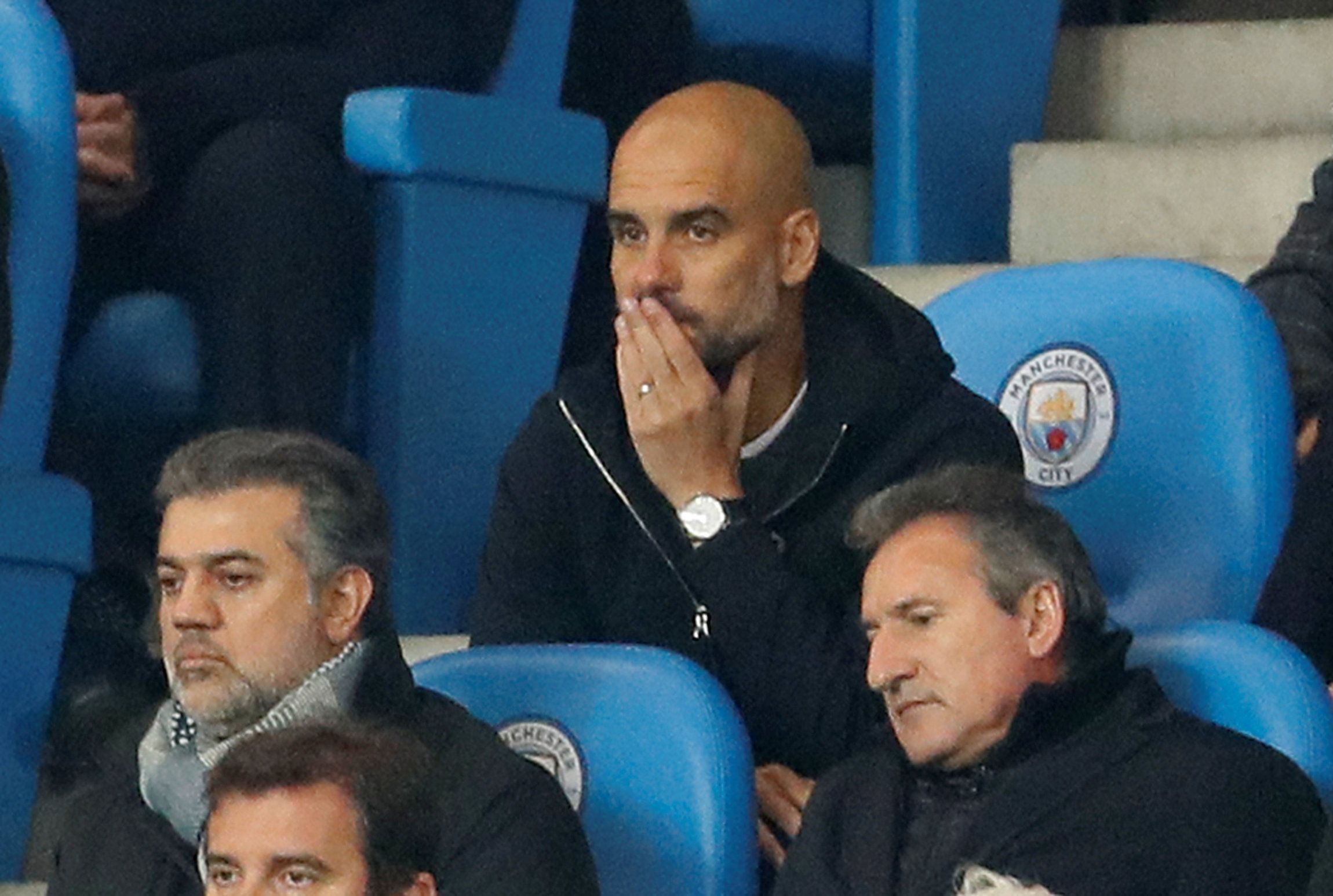 Pep Guardiola looks on after being sent to the stands