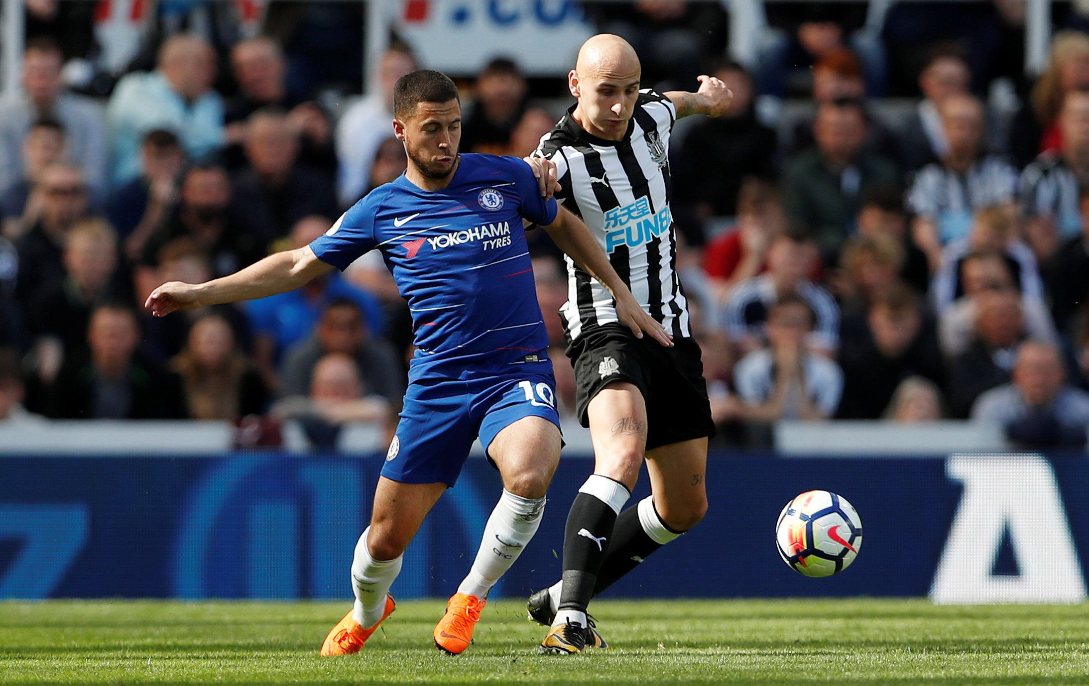Soccer Football - Premier League - Newcastle United vs Chelsea - St James' Park, Newcastle, Britain - May 13, 2018   Chelsea's Eden Hazard in action with Newcastle United's Jonjo Shelvey    Action Images via Reuters/Lee Smith    EDITORIAL USE ONLY. No use with unauthorized audio, video, data, fixture lists, club/league logos or 