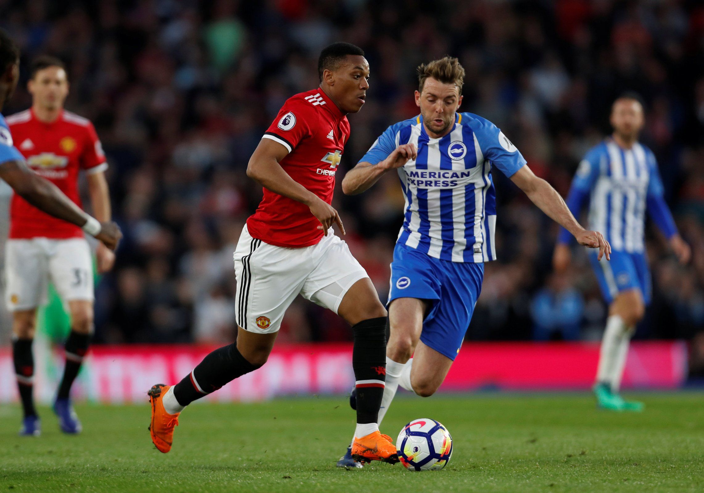 Anthony Martial in action with Dale Stephens