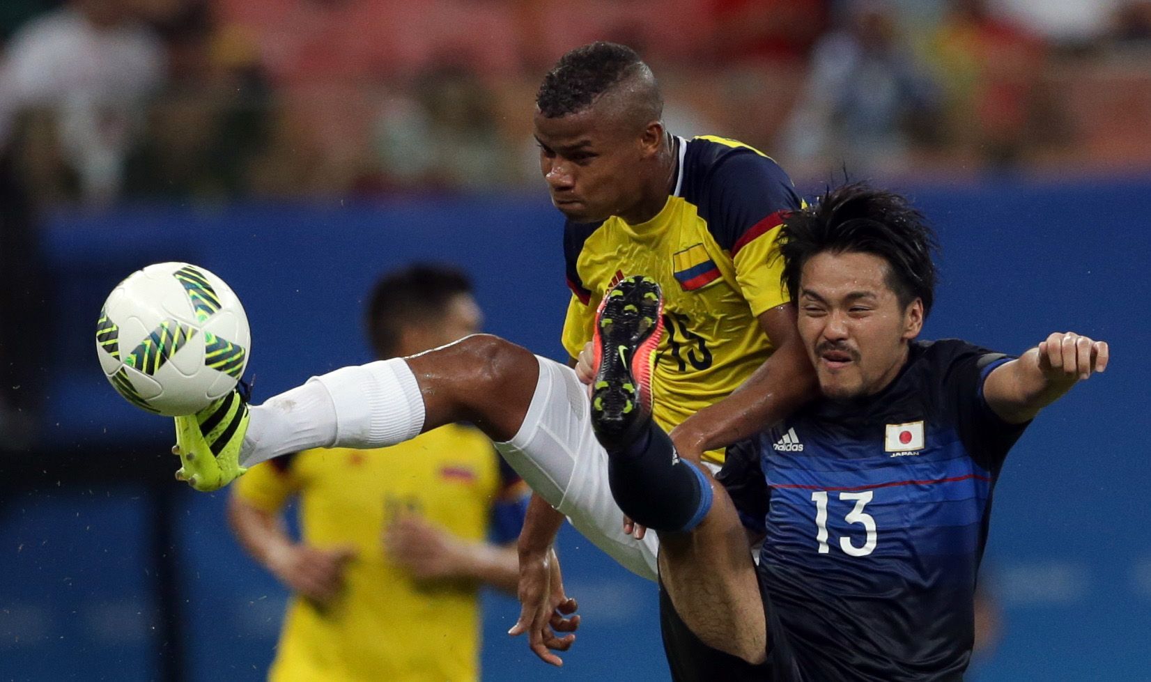 2016 Rio Olympics - Soccer - Preliminary - Men's First Round - Group B Japan v Colombia- Amazonia Stadium - Manaus, Brazil - 07/08/2016. Wilmar Barrios (COL) of Colombia and Shinzo Koroki (JPN) of Japan. REUTERS/Bruno Kelly FOR EDITORIAL USE ONLY. NOT FOR SALE FOR MARKETING OR ADVERTISING CAMPAIGNS.  
Picture Supplied by Action Images