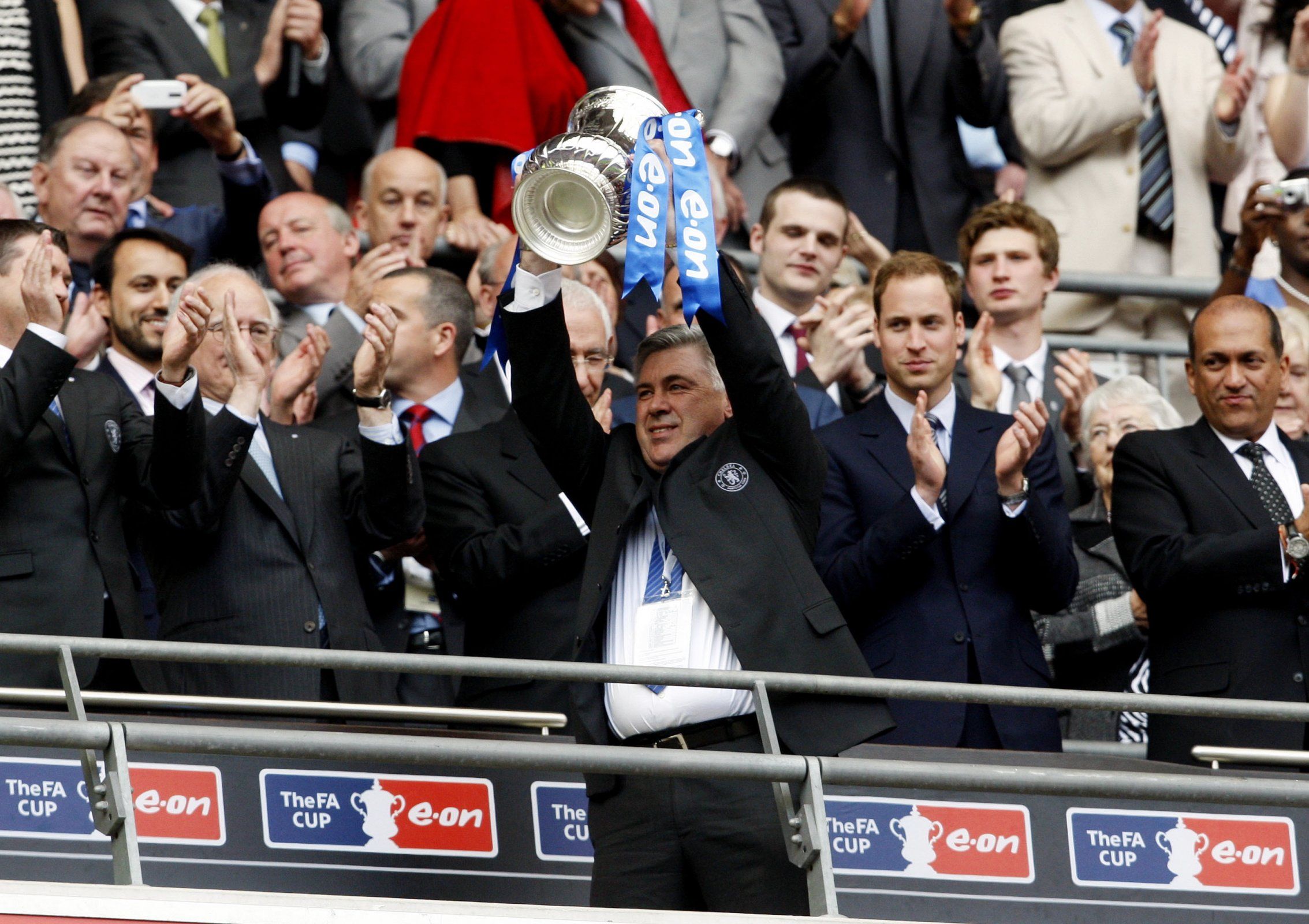 Carlo Ancelotti lifts the FA Cup
