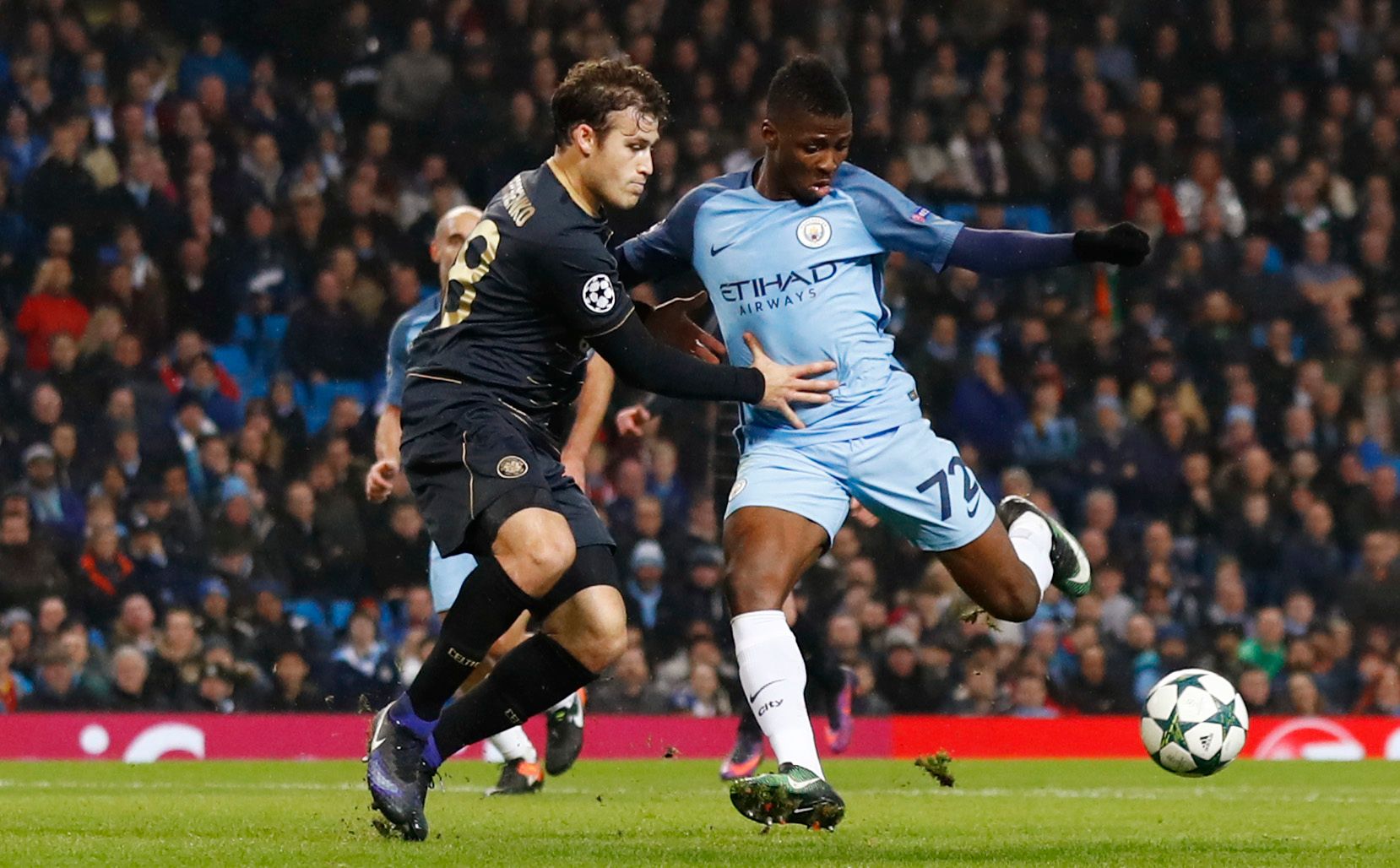Britain Football Soccer - Manchester City v Celtic - UEFA Champions League Group Stage - Group C - Etihad Stadium, Manchester, England - 6/12/16 Manchester City's Kelechi Iheanacho in action with Celtic's Erik Sviatchenko  Action Images via Reuters / Jason Cairnduff Livepic EDITORIAL USE ONLY.