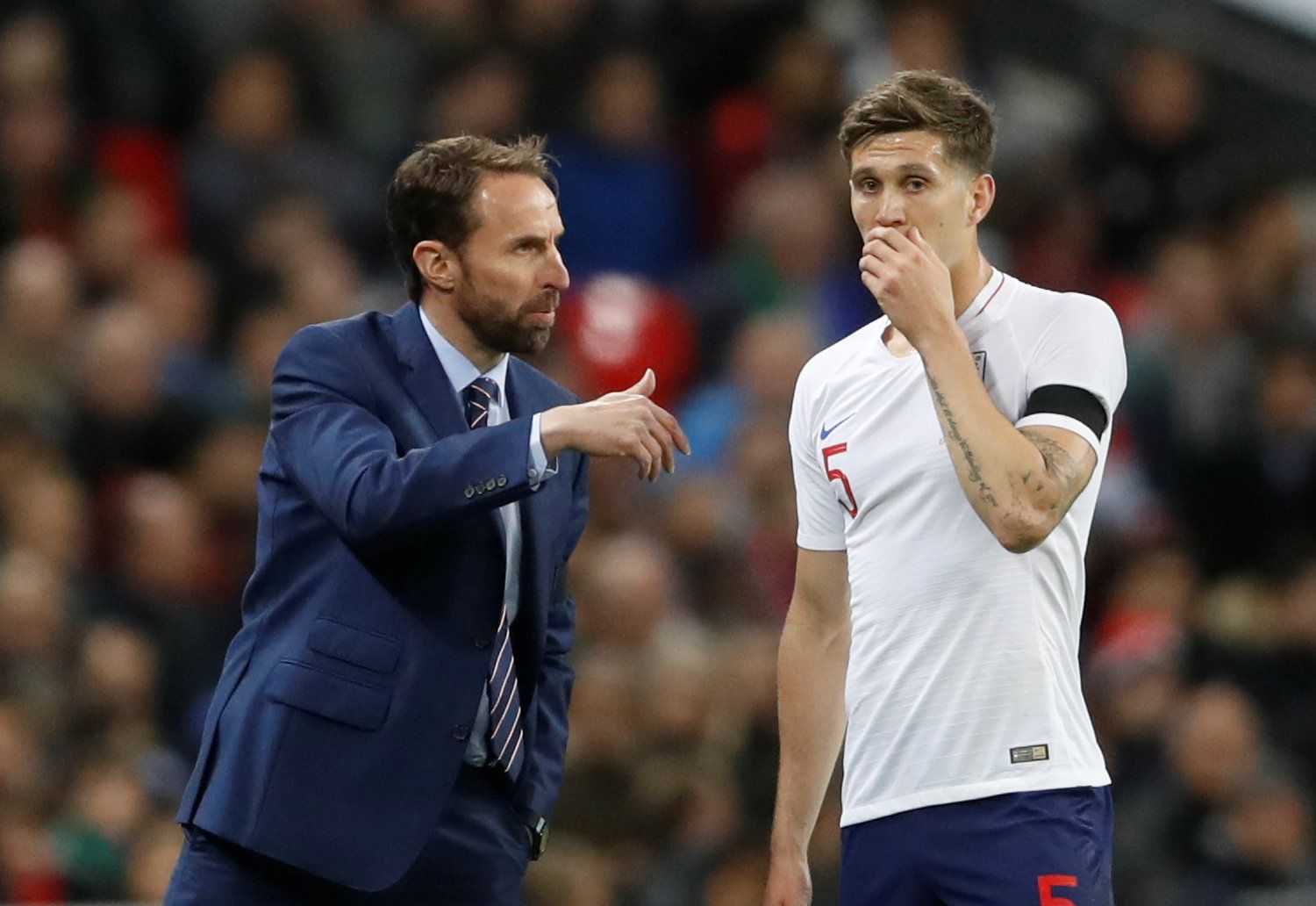 Soccer Football - International Friendly - England vs Italy - Wembley Stadium, London, Britain - March 27, 2018   England manager Gareth Southgate and John Stones         Action Images via Reuters/Carl Recine