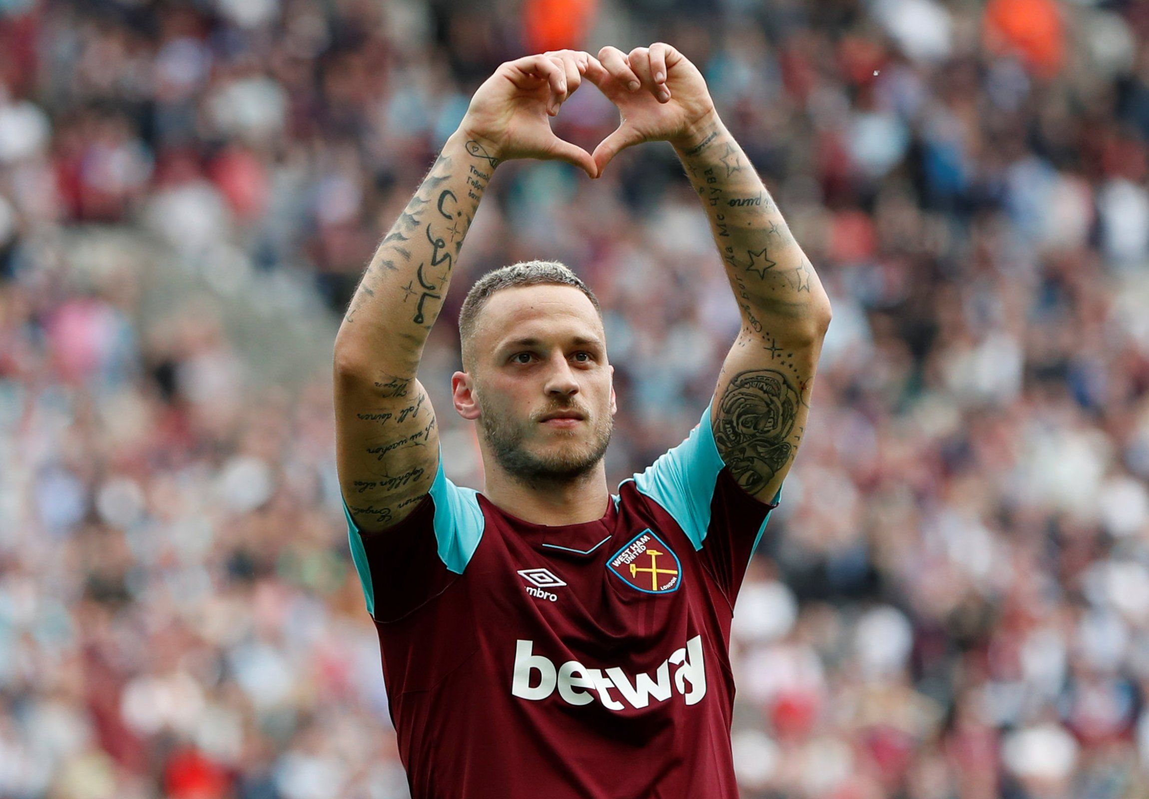 Marko Arnautovic makes a loveheart to the West Ham fans
