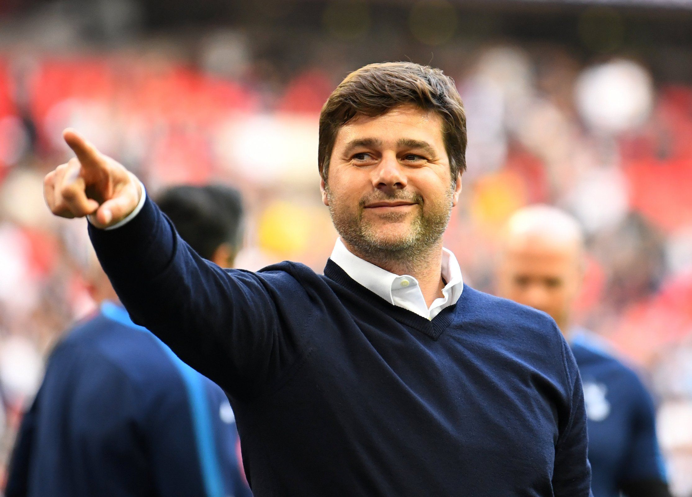 Mauricio Pochettino points at the Tottenham fans after beating Leicester City