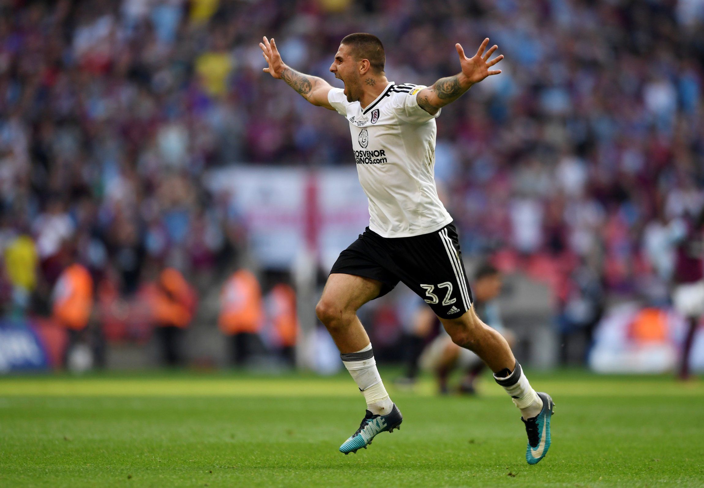Newcastle forward Aleksandar Mitrovic celebrates after winning with Fulham