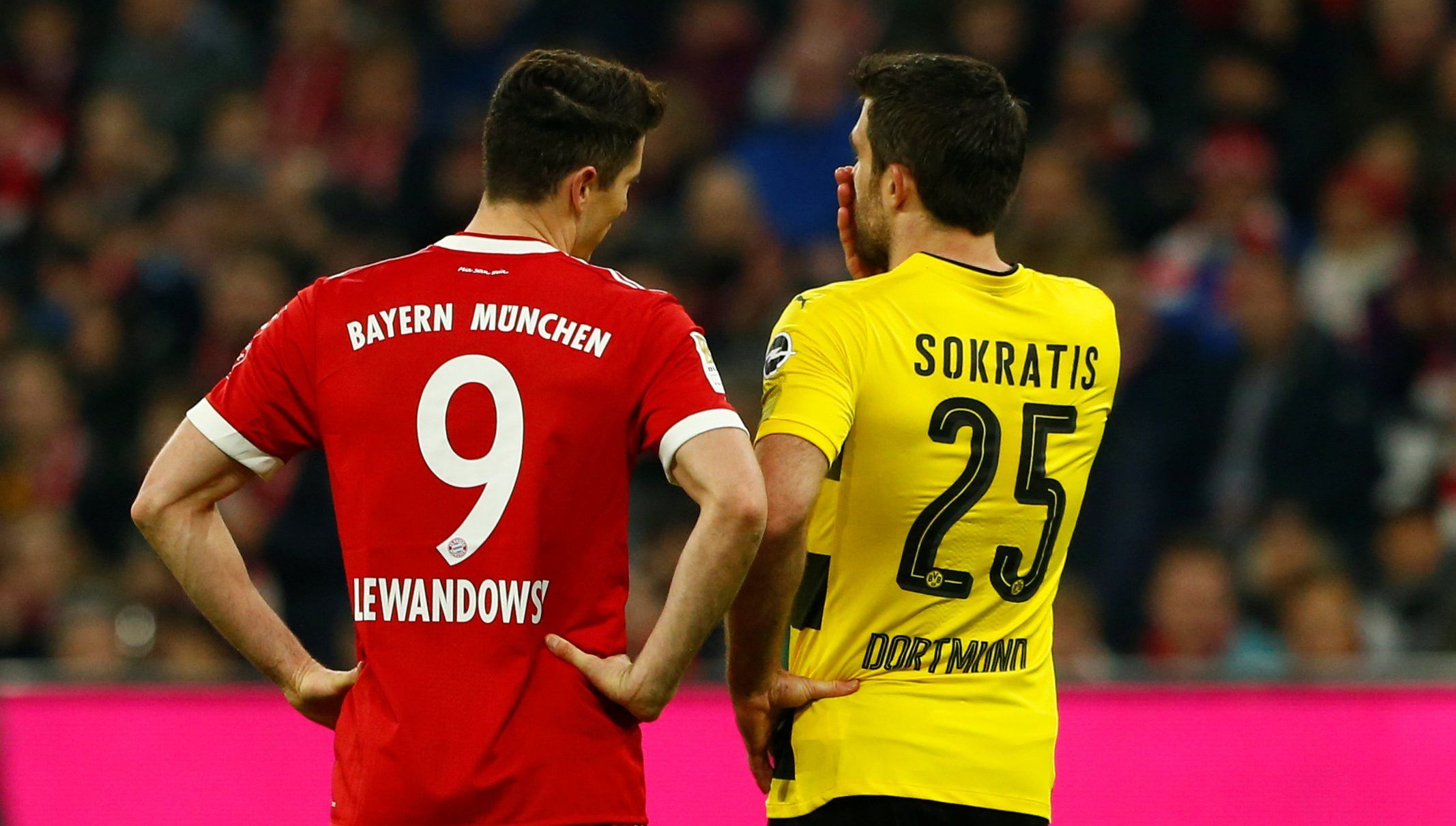 Soccer Football - Bundesliga - Bayern Munich vs Borussia Dortmund - Allianz Arena, Munich, Germany - March 31, 2018   Bayern Munich's Robert Lewandowski and Borussia Dortmund's Sokratis Papastathopoulos    REUTERS/Michaela Rehle    DFL RULES TO LIMIT THE ONLINE USAGE DURING MATCH TIME TO 15 PICTURES PER GAME. IMAGE SEQUENCES TO SIMULATE VIDEO IS NOT ALLOWED AT ANY TIME. FOR FURTHER QUERIES PLEASE CONTACT DFL DIRECTLY AT + 49 69 650050