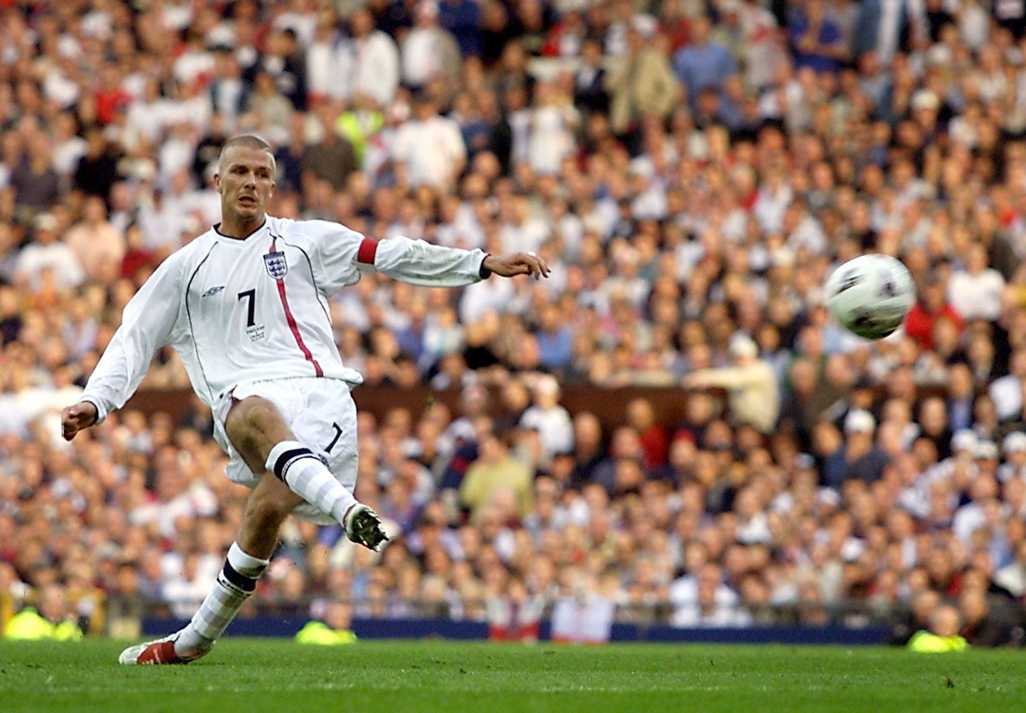 England's David Beckham scores against Greece in qualification for 2002 World Cup
